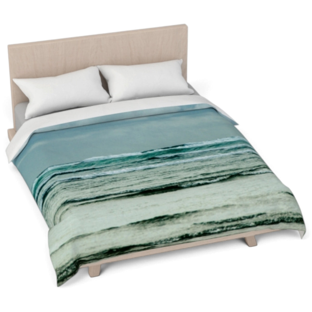 A bed dressed with a duvet cover featuring an abstract ocean wave pattern in shades of teal, green, and white, styled with two white pillows on a light wood bed frame against a white background.