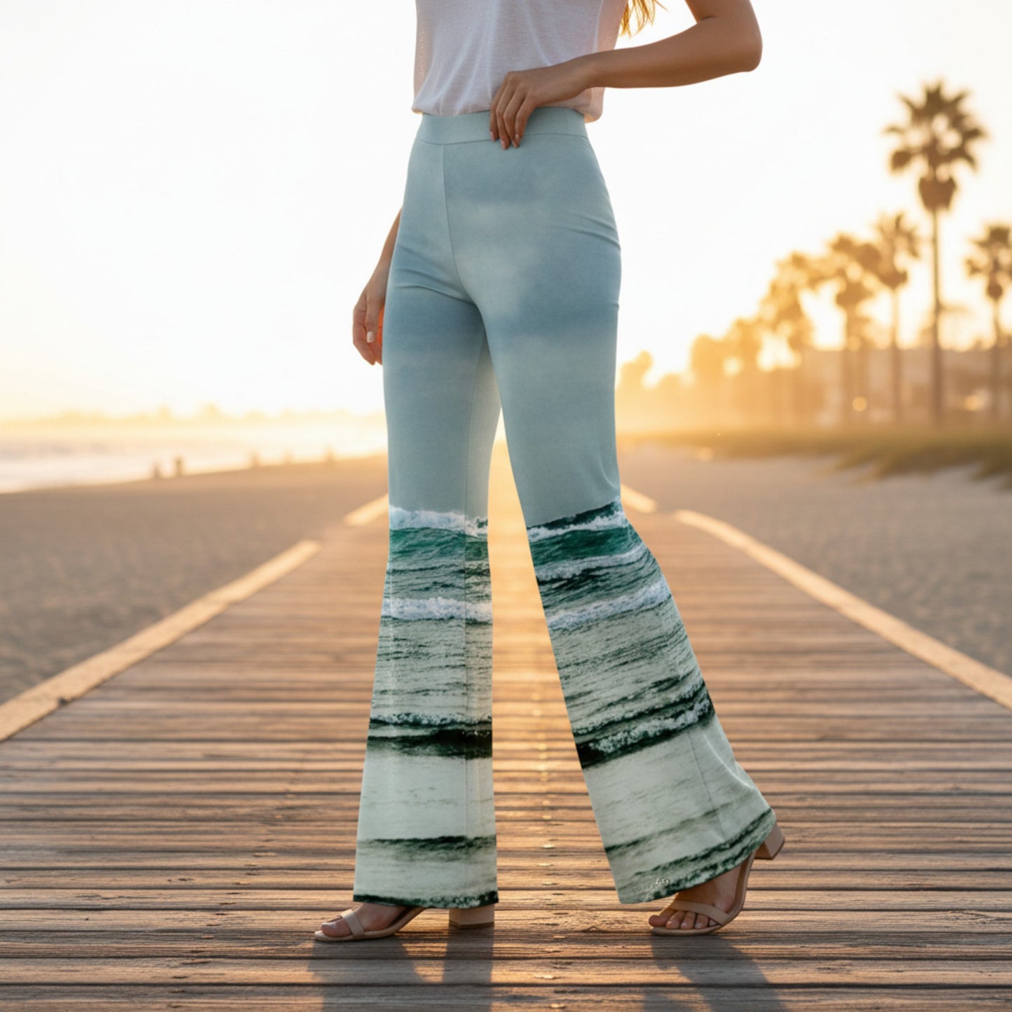 Person wearing light blue flared pants with a striped pattern on a wooden boardwalk.