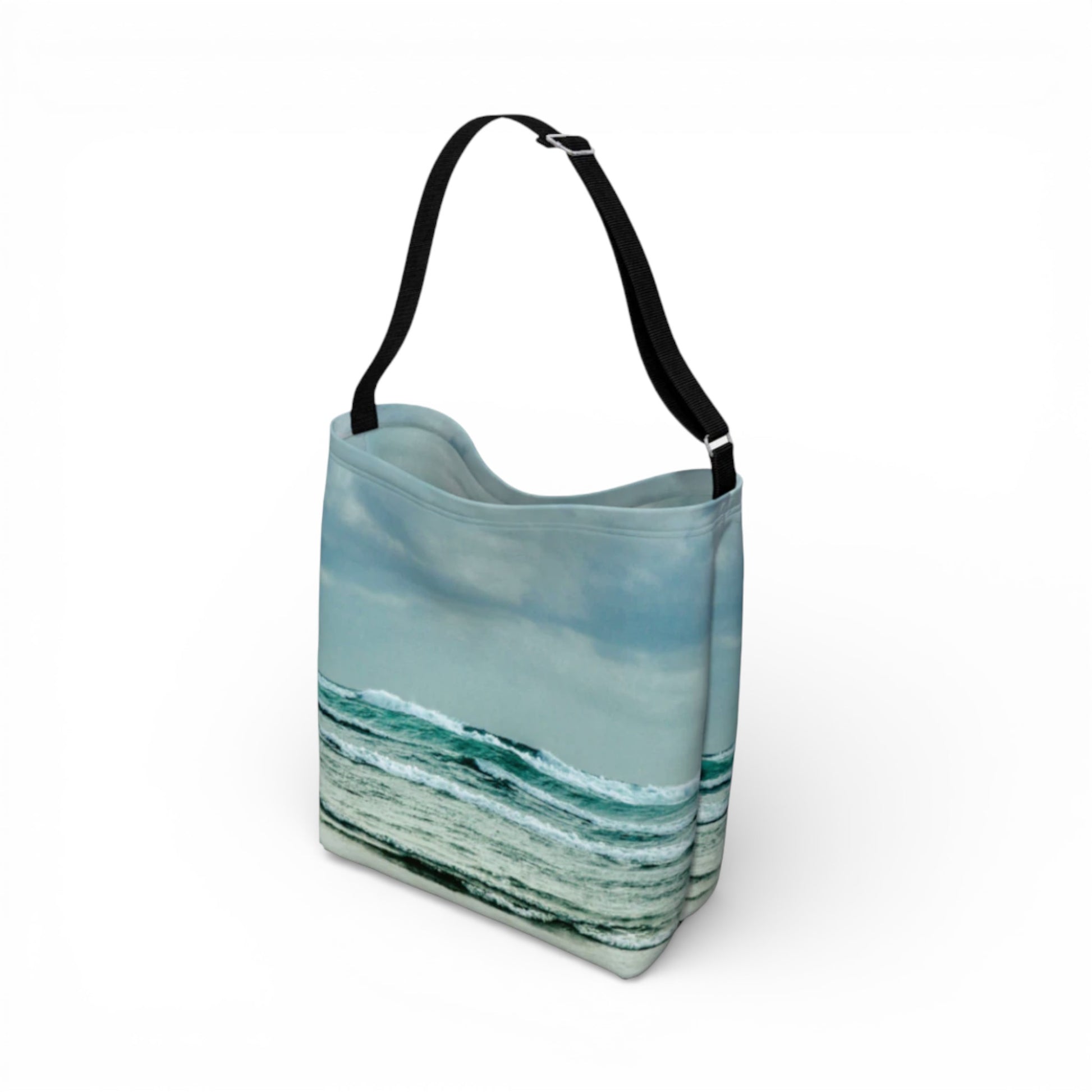 Tote bag with ocean wave design on a white background