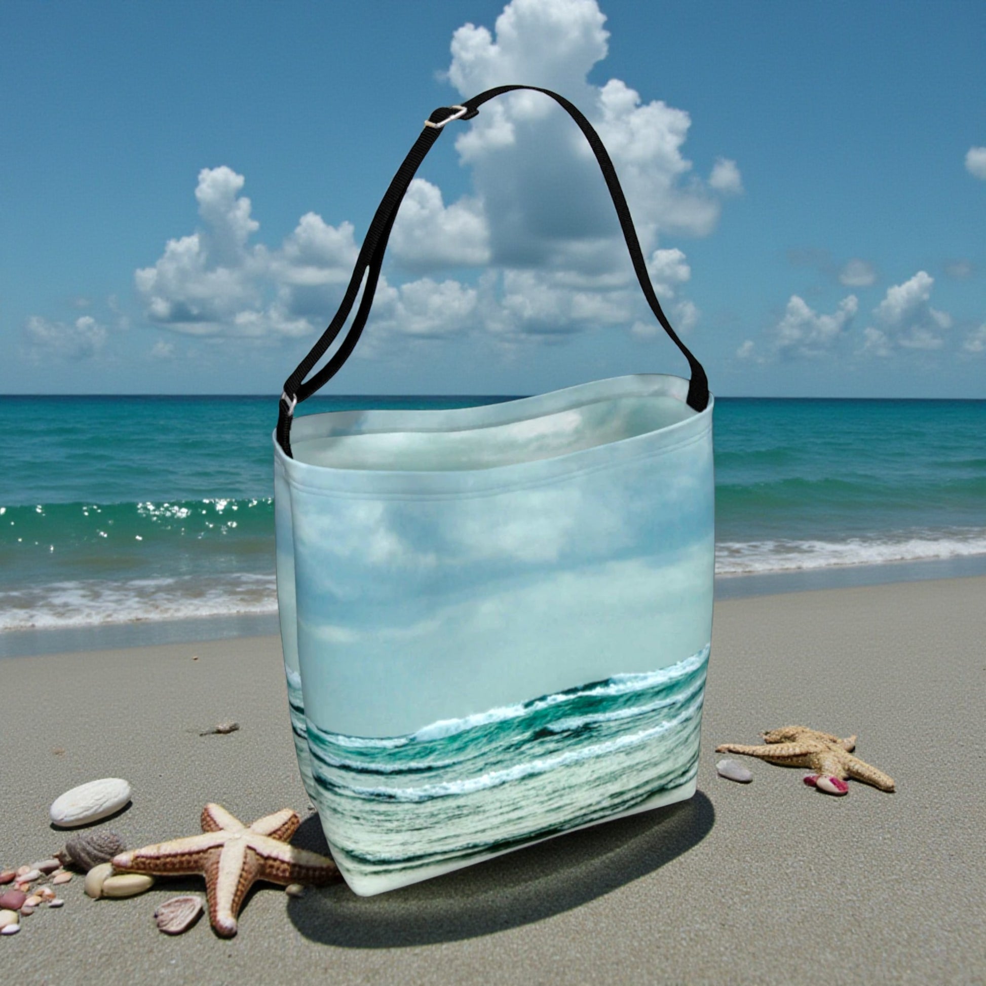 Tote Bag with ocean design on a beach with starfish and shells