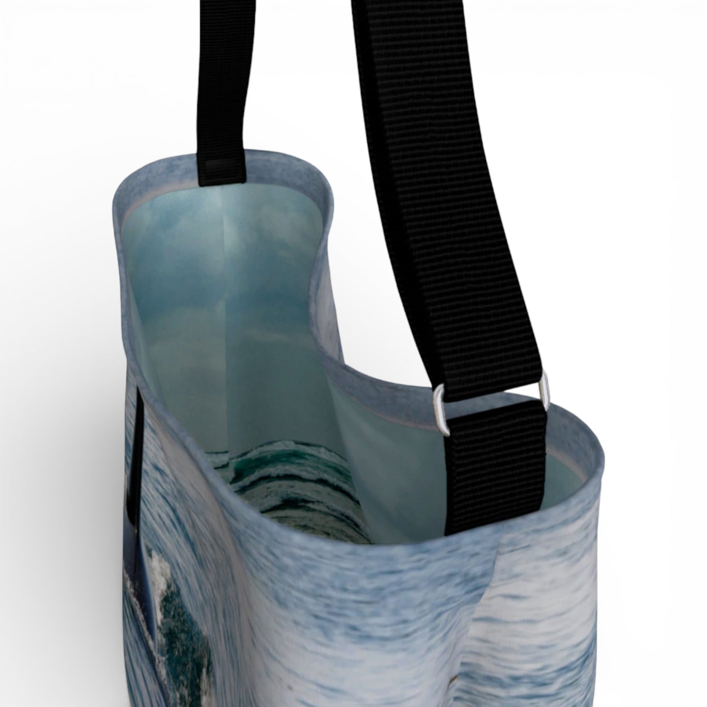 Tote bag with a black strap on a white background