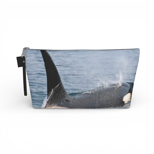 Pouch with an orca whale design on a white background