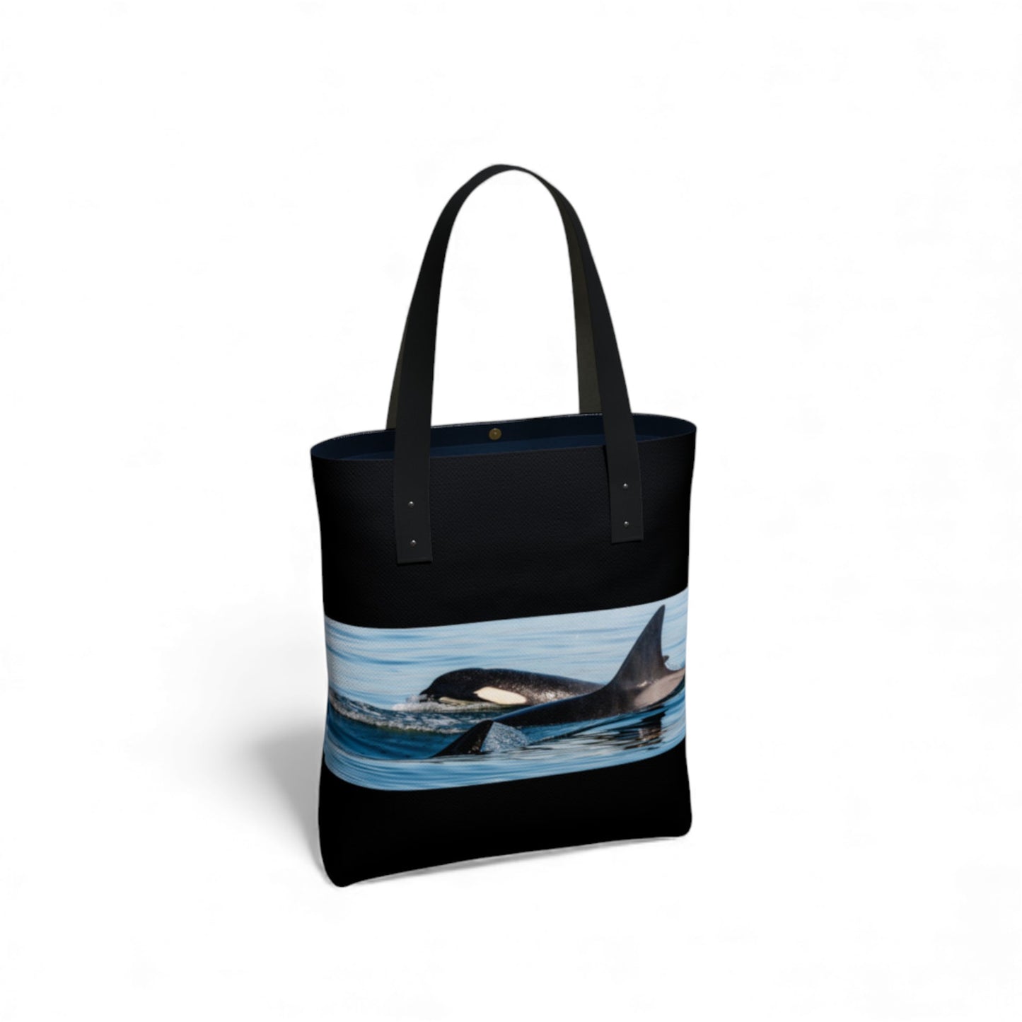 Tote bag with an orca whale design on a white background