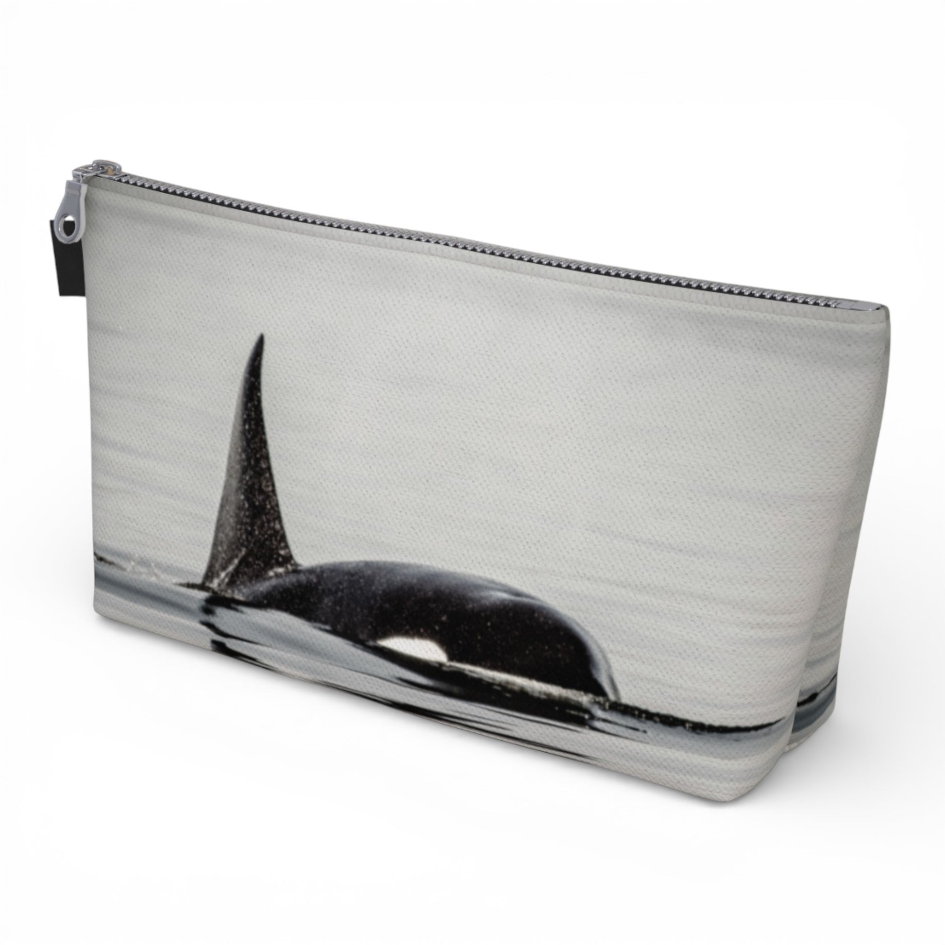 Pouch with a whale design on a white background