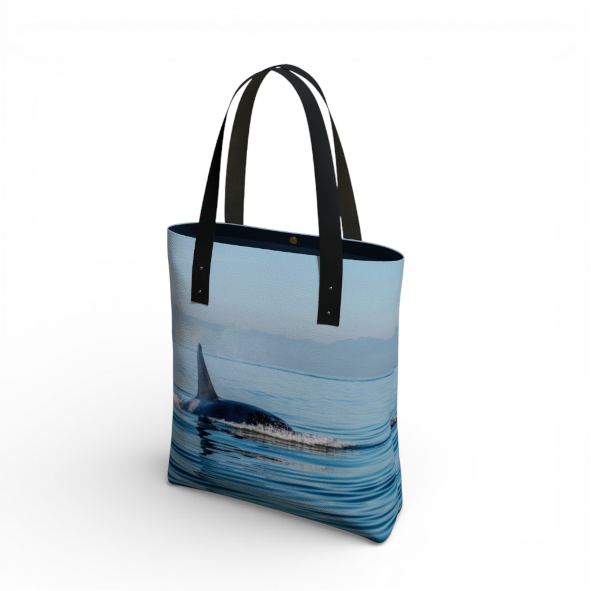 Tote bag with a whale design on a white background