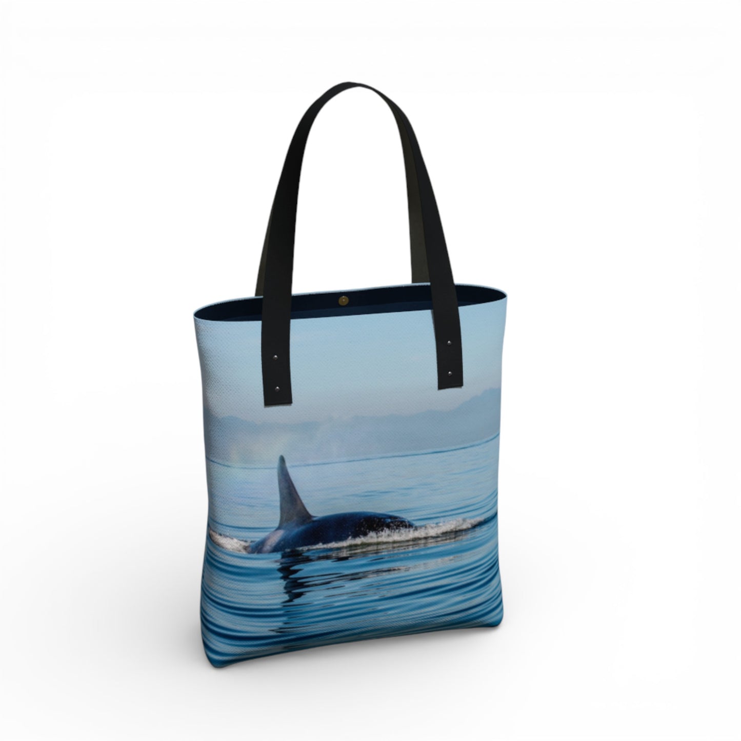 Tote bag with a whale design on a white background