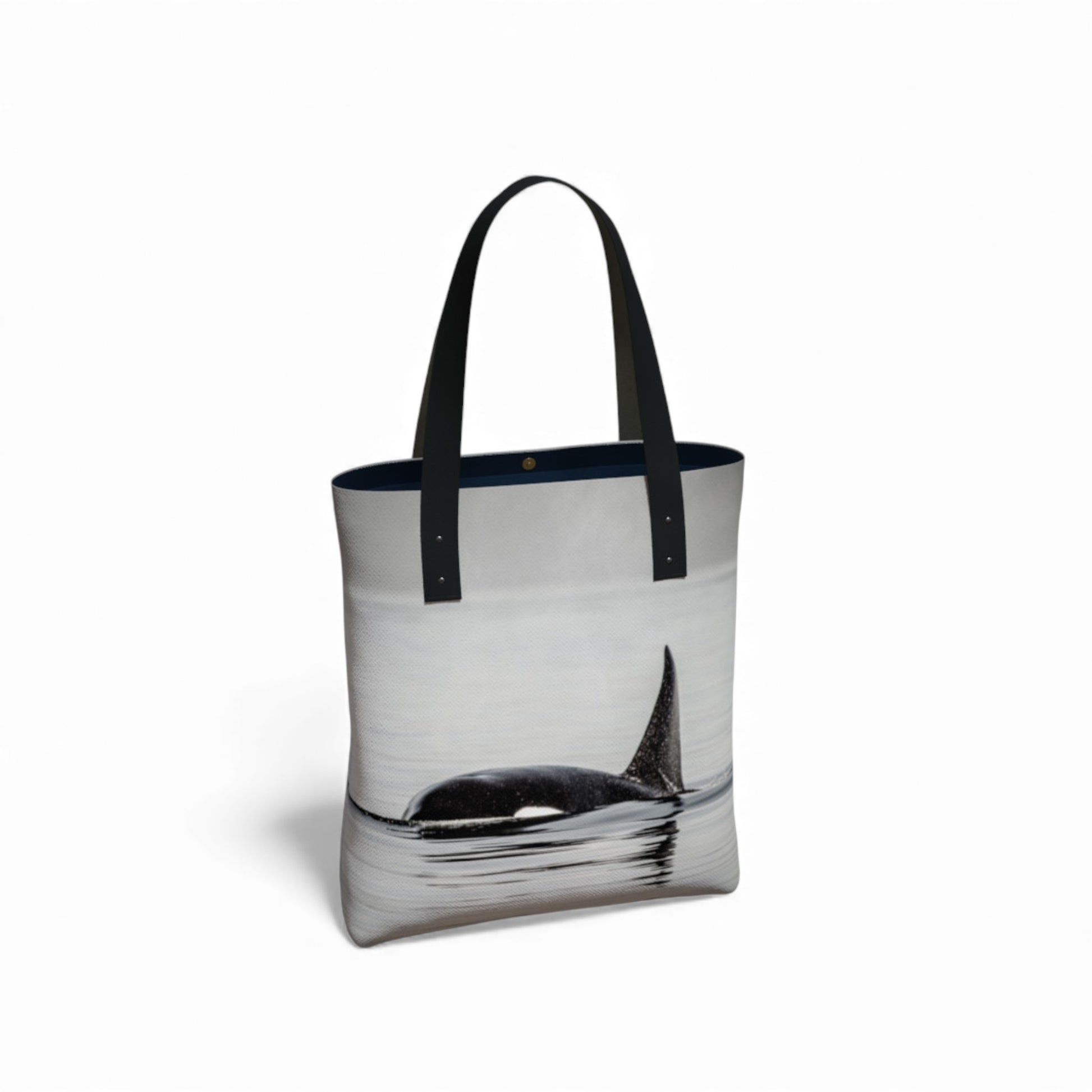 Tote bag with whale design on a white background