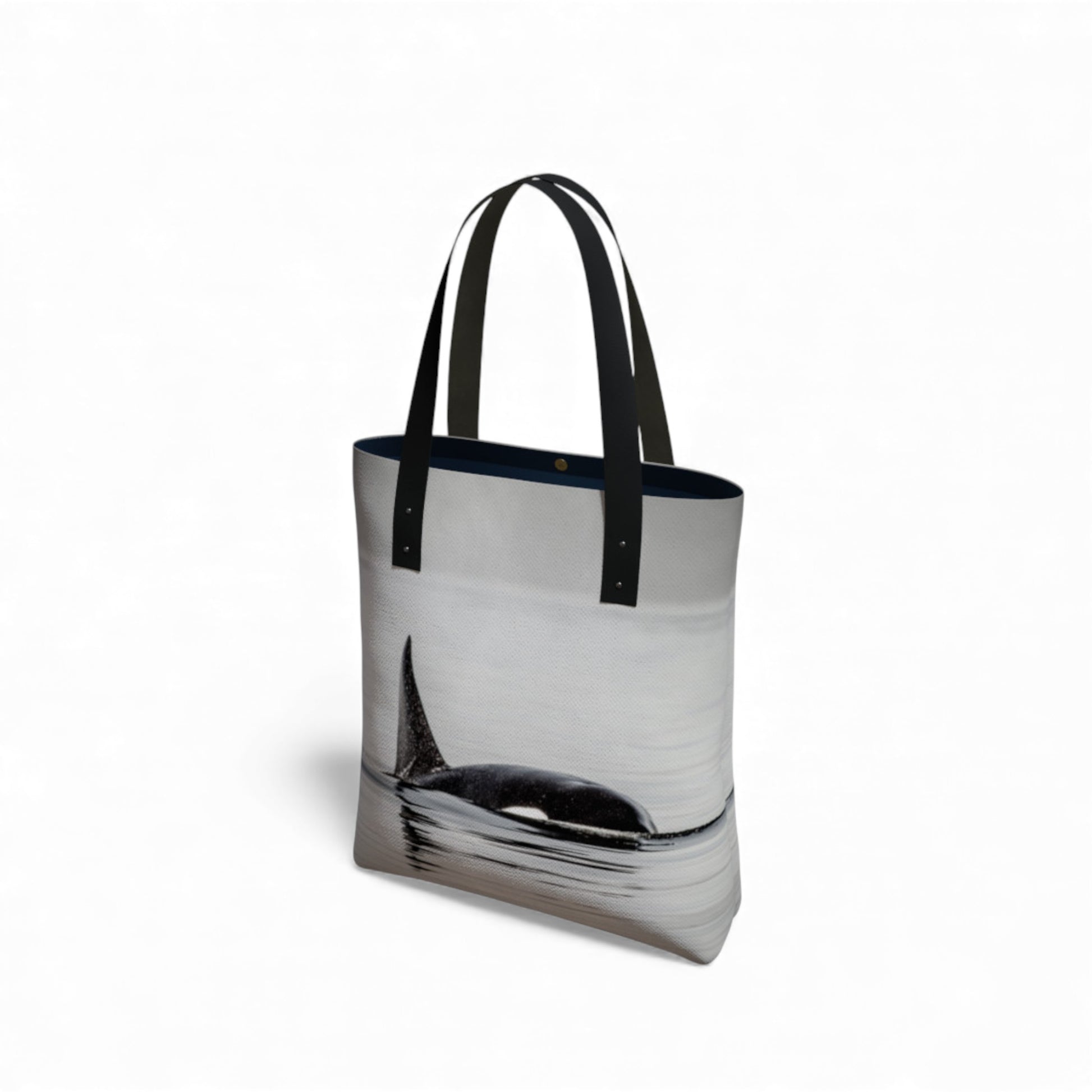 Tote bag with whale design on a white background
