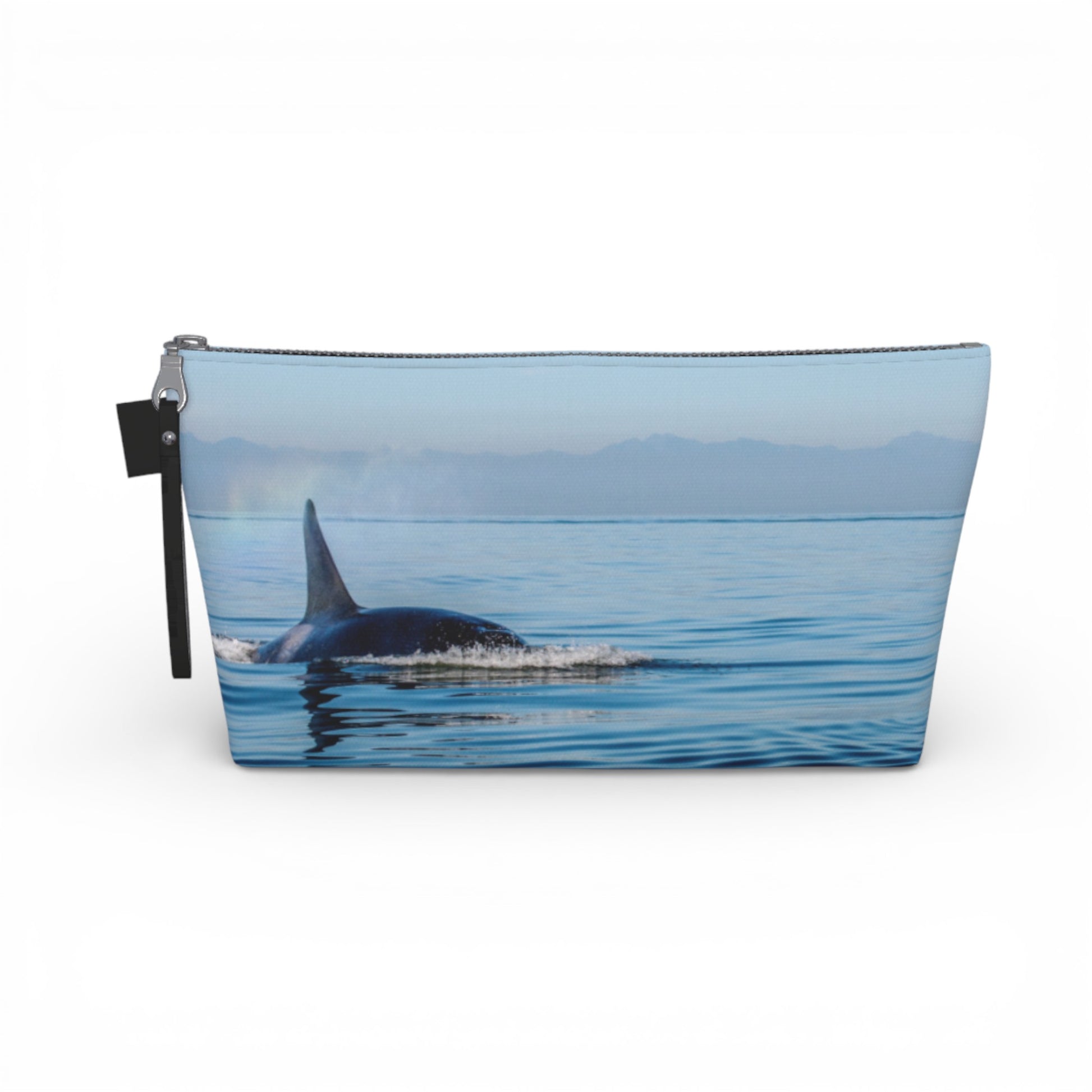 Pouch with an orca whale design on a white background