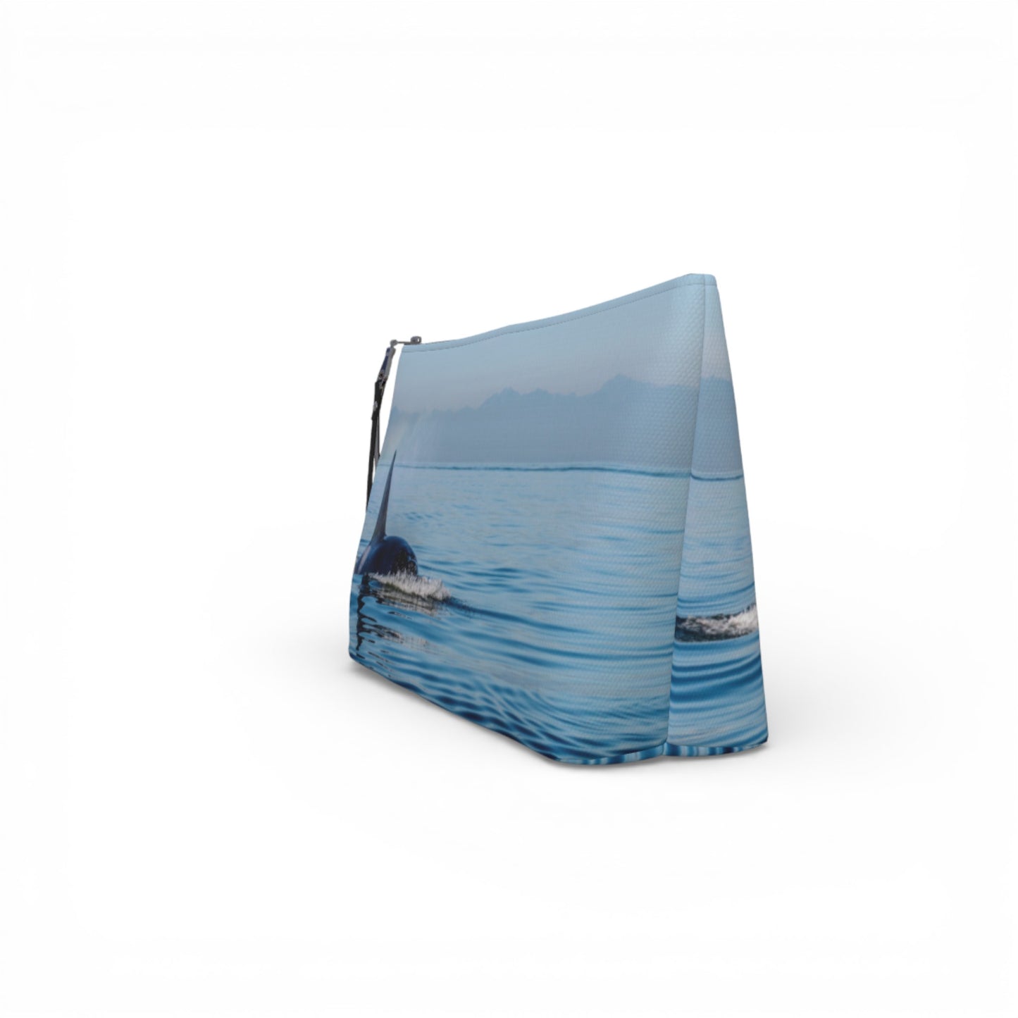 Blue pouch with a scenic design of water and mountains on a white background