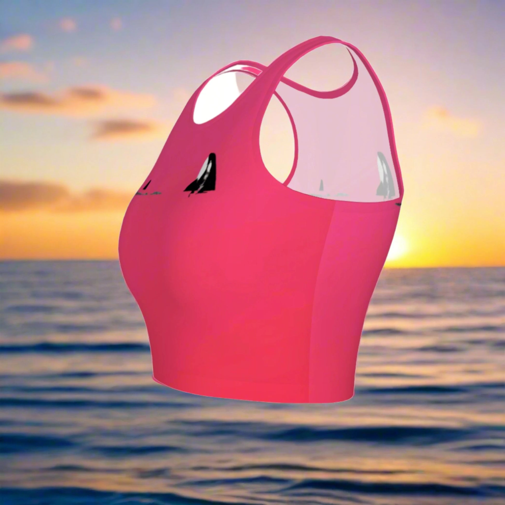 Orca spy hop active crop top.  It is pink with a simple image of a orca in the spy hop position. 