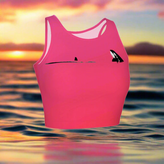 Orca spy hop active crop top.  It is pink with a simple image of a orca in the spy hop position. 
