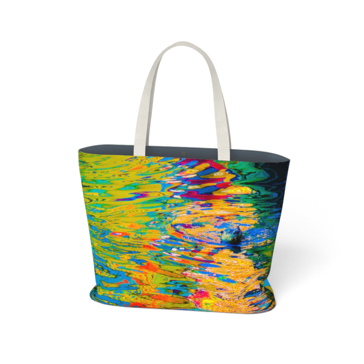 A tote bag with a vibrant, multicolored abstract print resembling rippling water reflections, featuring off-white fabric handles and a dark interior, shown on a plain white background.