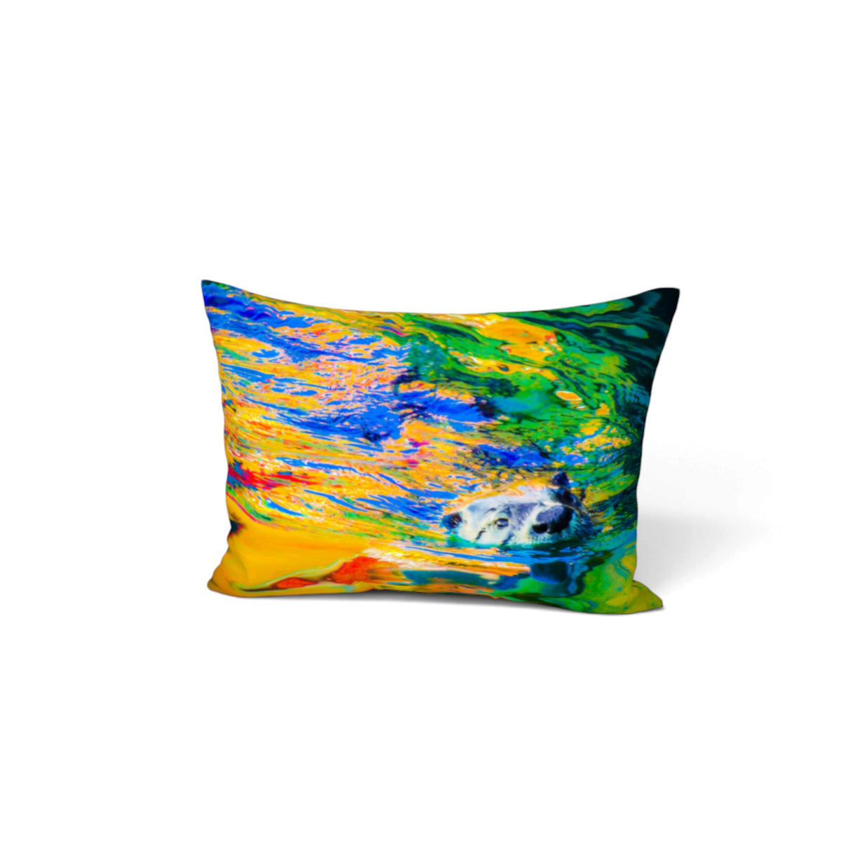A rectangular decorative throw pillow featuring a vibrant, abstract painted design with swirling brushstrokes of blue, yellow, green, and orange, with a white polar bear illustration on the lower right, shown against a plain white background.
