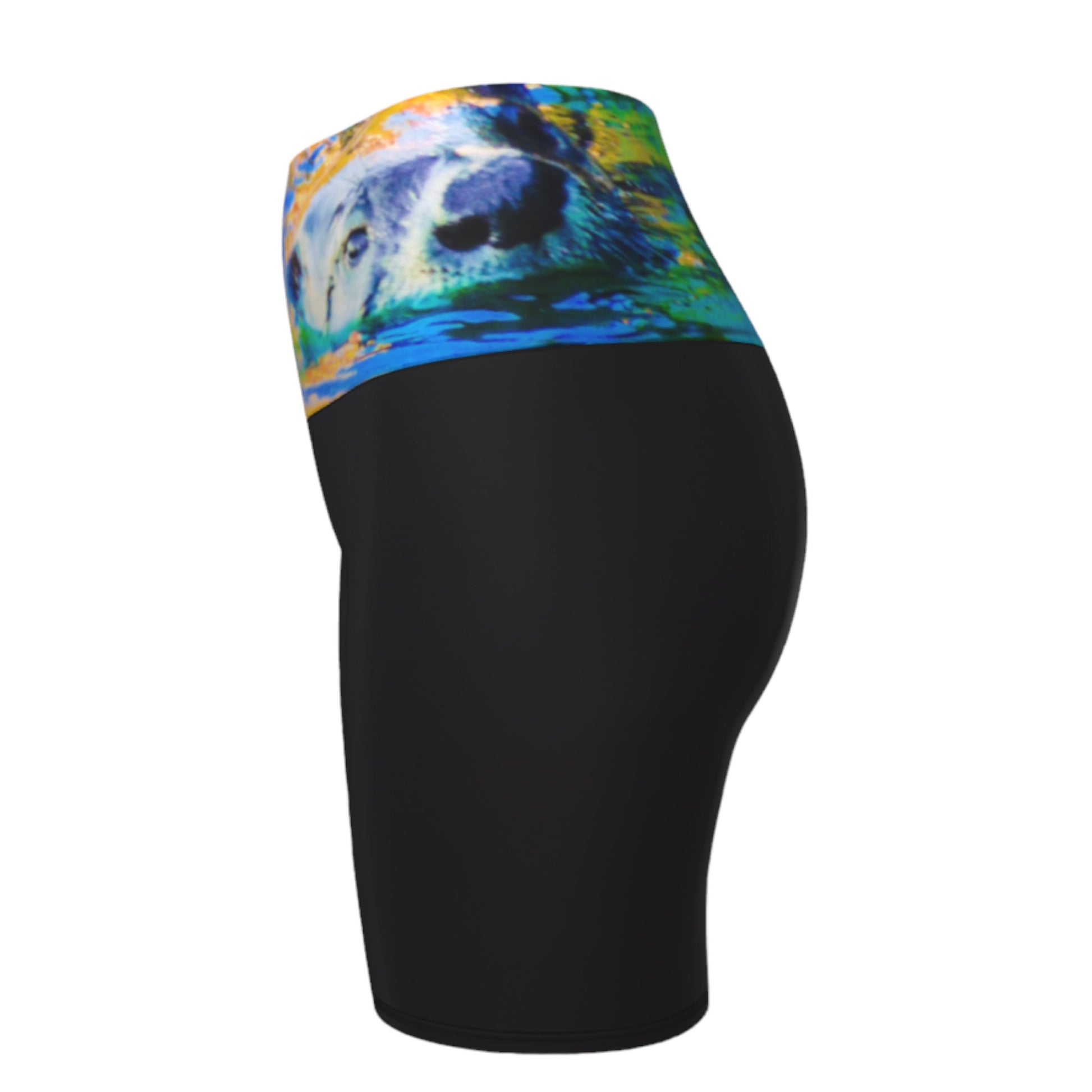 Otter Art Yoga Shorts feature a image of a sea otter printed on the waistband. The rest of the shorts are black.