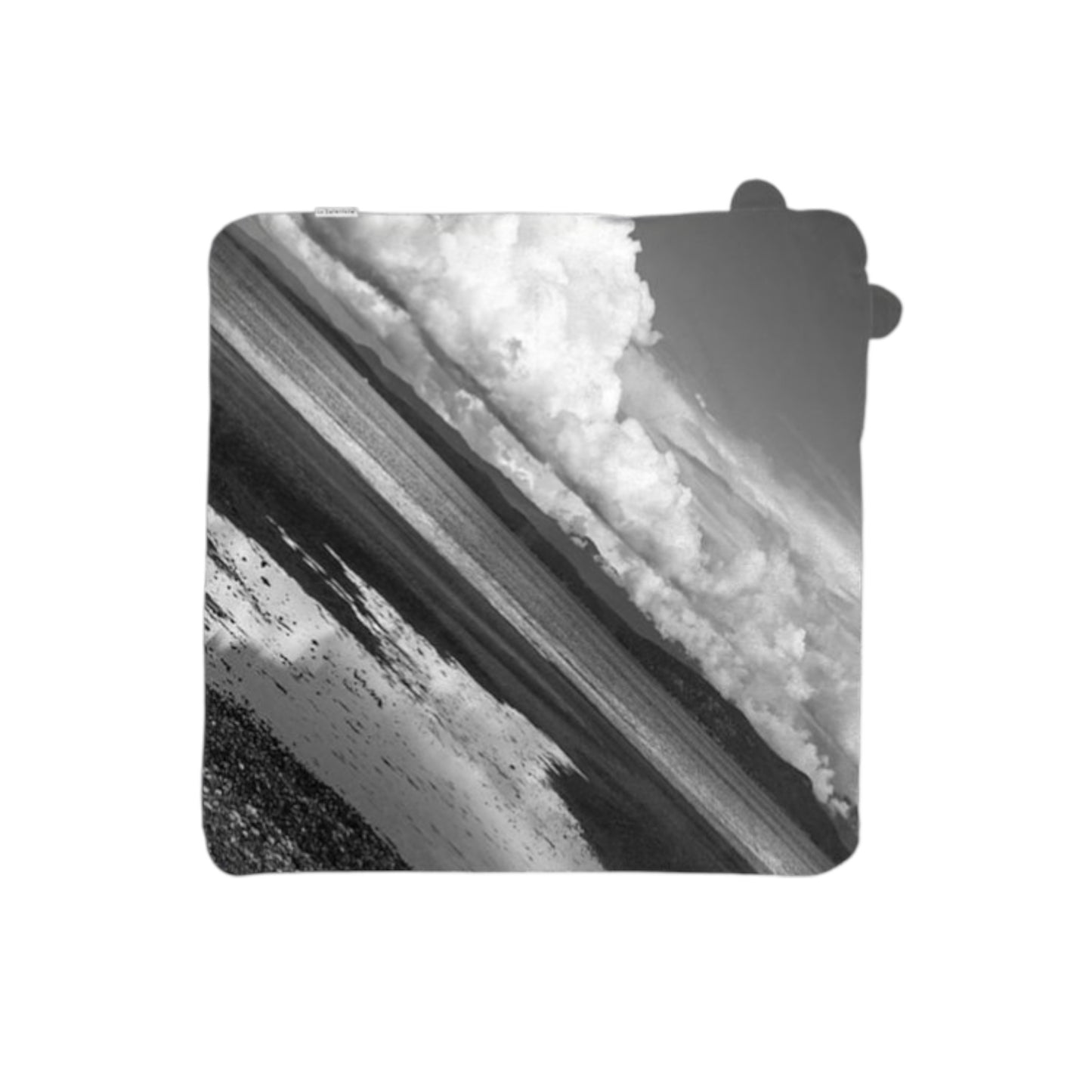 Black and white image on a baby towel.