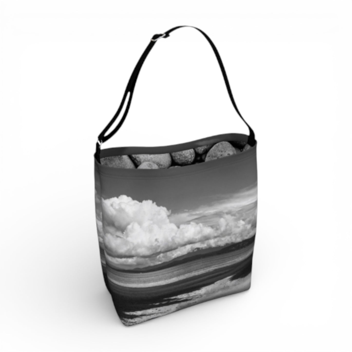 Tote bag with a black and white landscape design on a white background