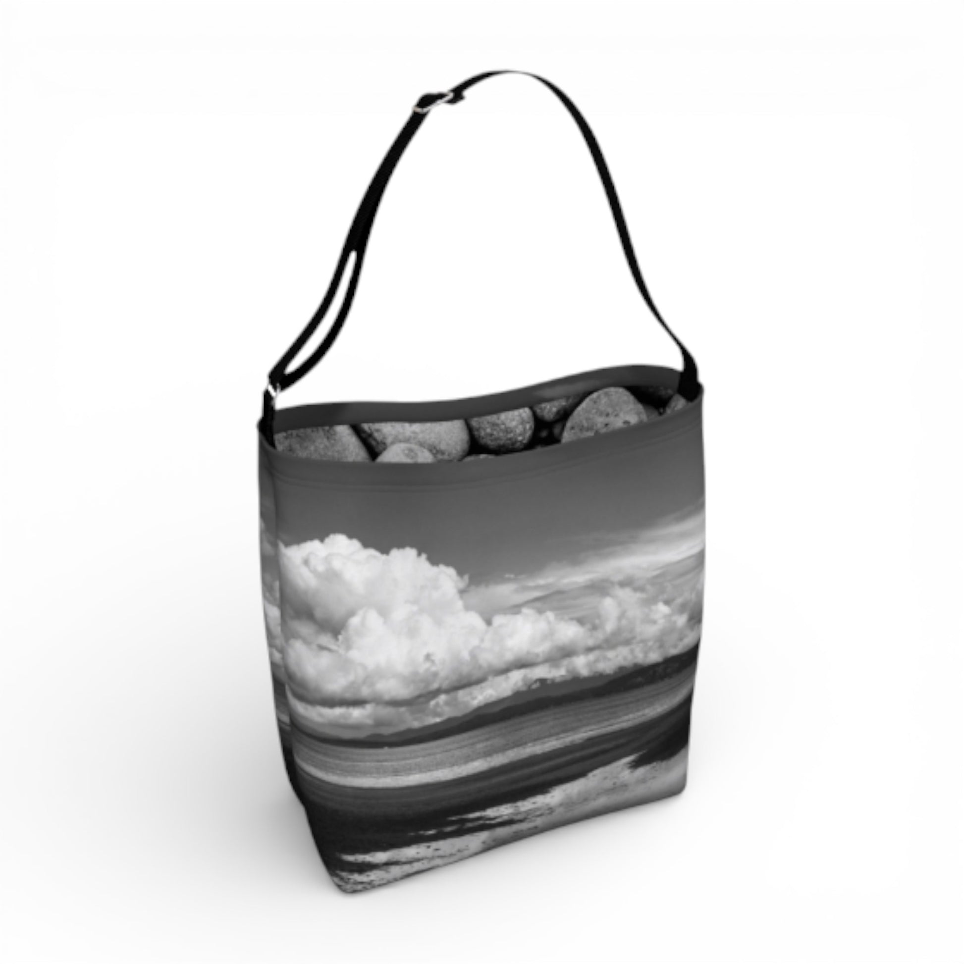 Tote bag with a black and white landscape design on a white background