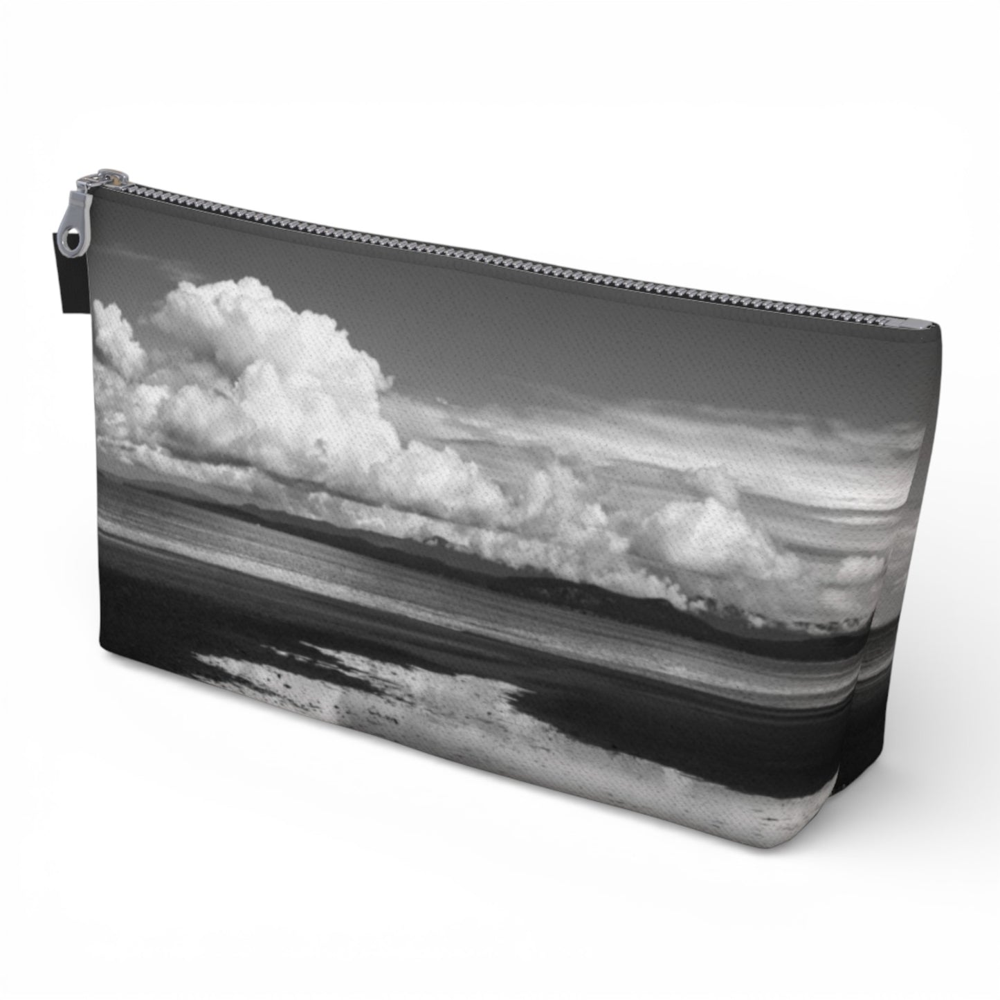 Pouch with a black and white beach scene design on a white background
