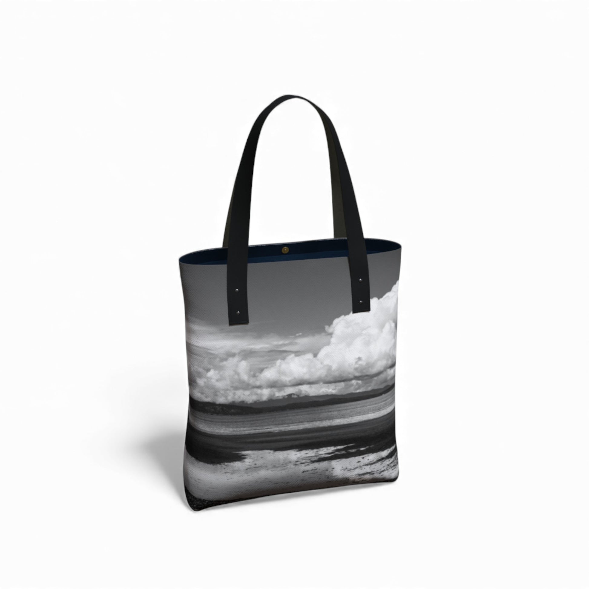 Tote bag with a black and white ocean design on a white background