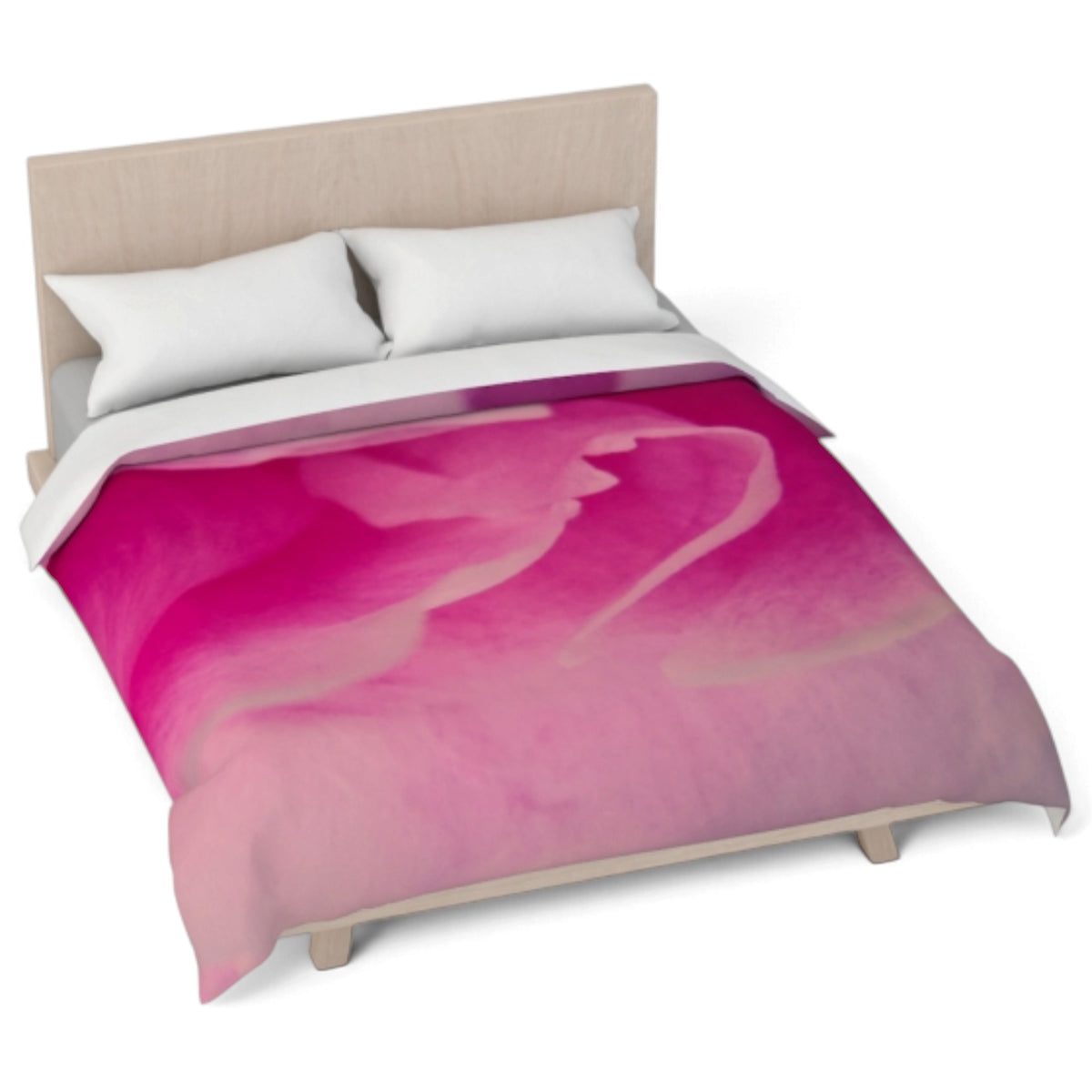 A bed dressed with a duvet cover featuring a pink and magenta abstract watercolor design, styled with two white pillows and a light wood headboard against a white background.