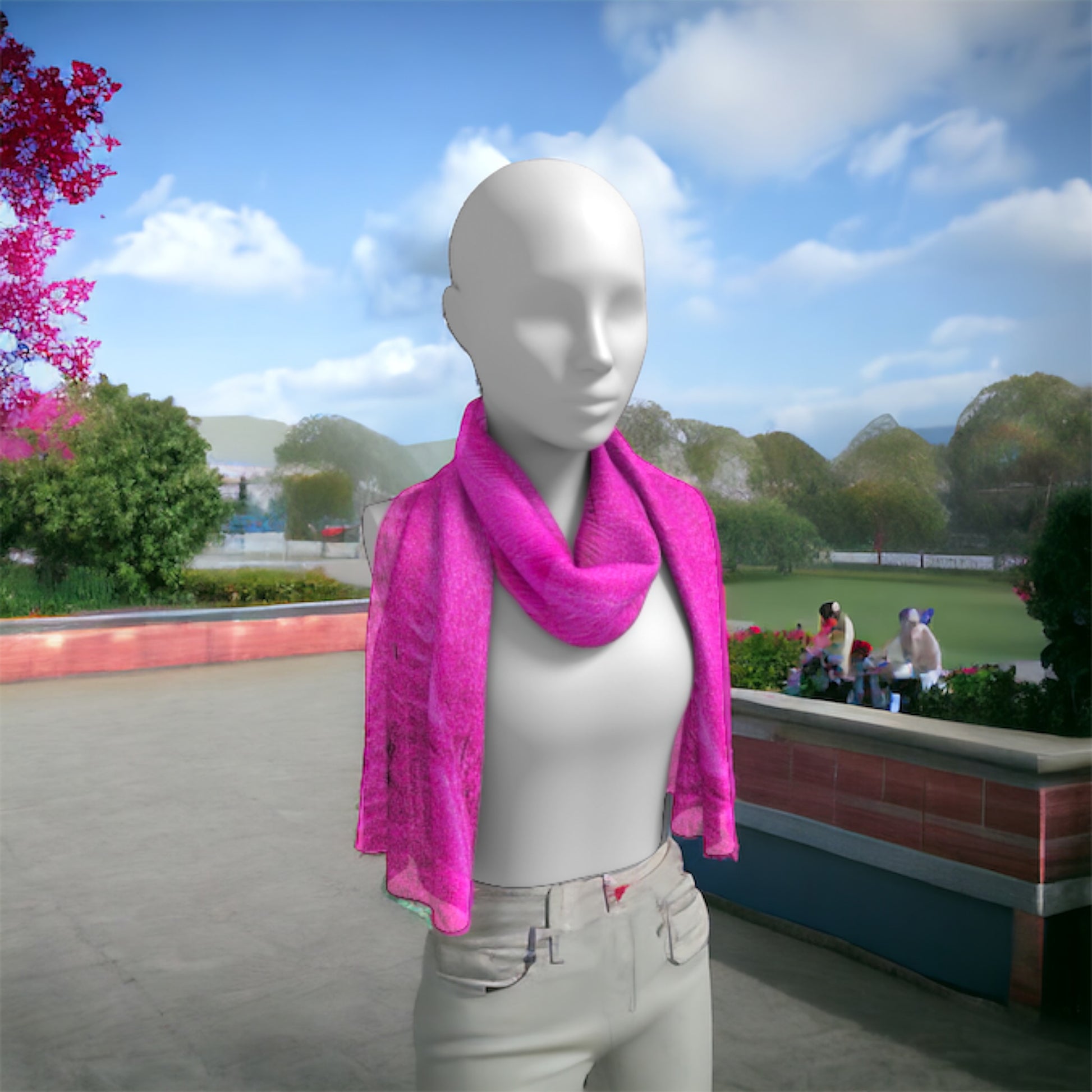 Pink Sand long scarf is shown worn around the neck.