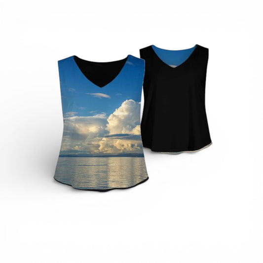 Tank Top with a scenic design of a sunset over water on one side and black on the other, displayed against a white background.