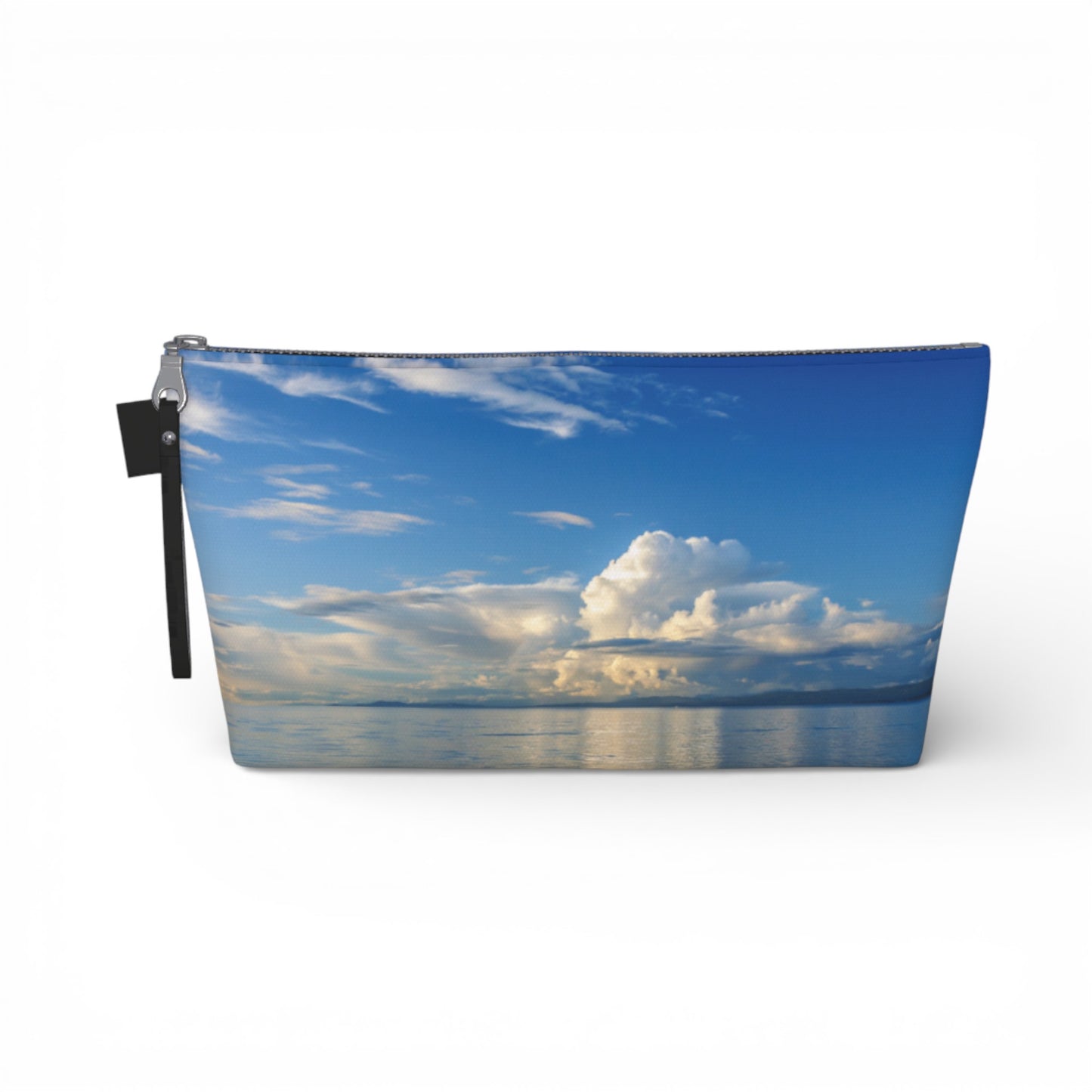 Pouch with a design of a blue sky and clouds on a white background