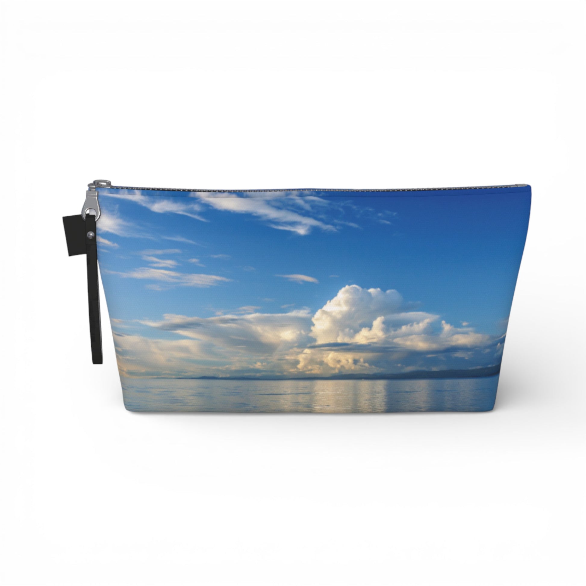 Pouch with a design of a blue sky and clouds on a white background