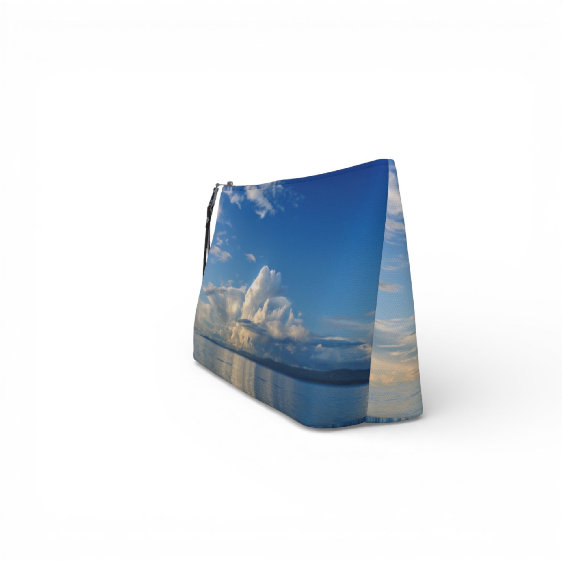 Pouch with a design of a mountain and blue sky on a white background
