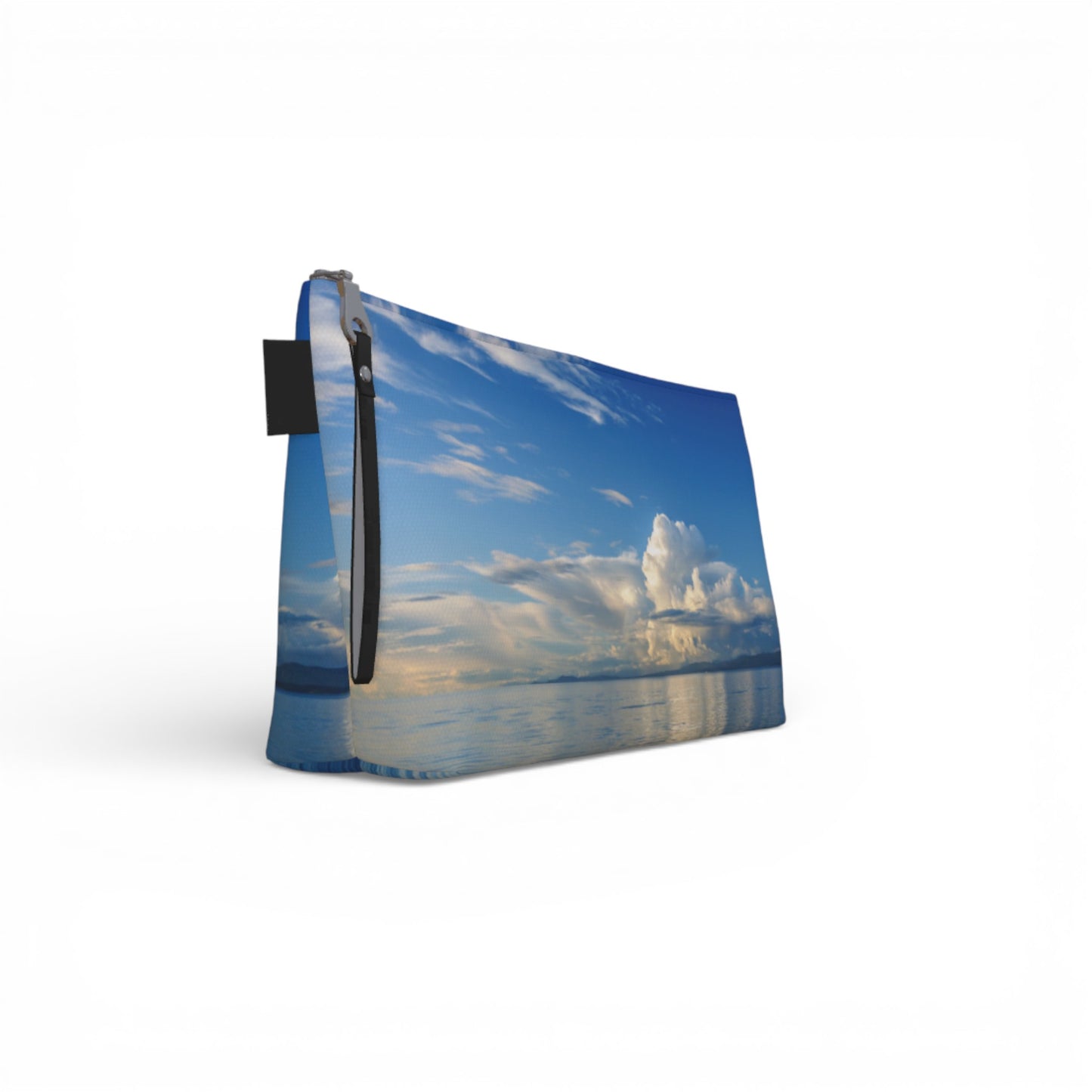 Pouch with a scenic design of a blue sky and clouds on a white background