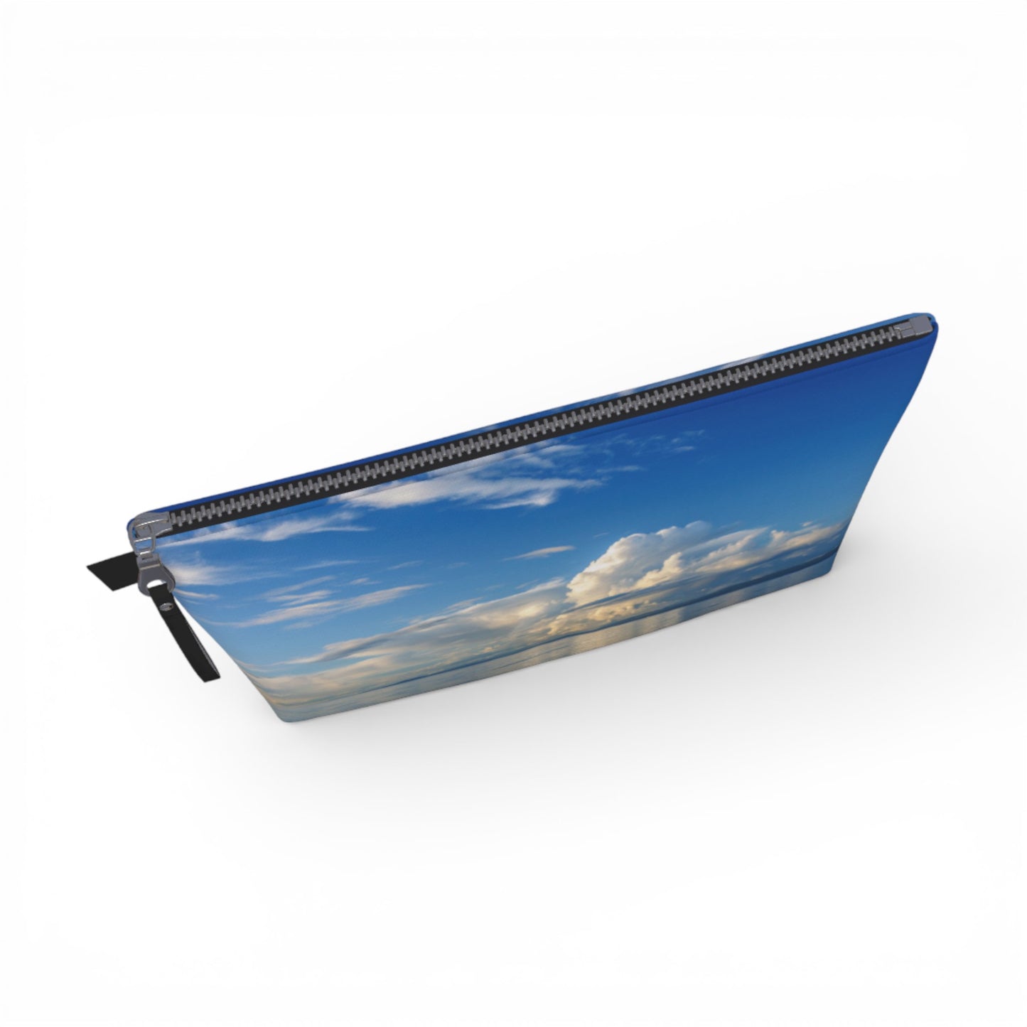 Pouch with a design of a blue sky and clouds on a white background