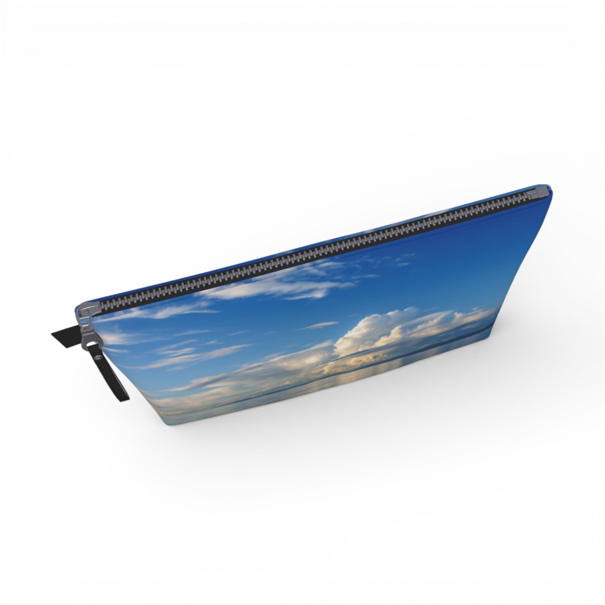 Pouch with a design of a blue sky and clouds on a white background