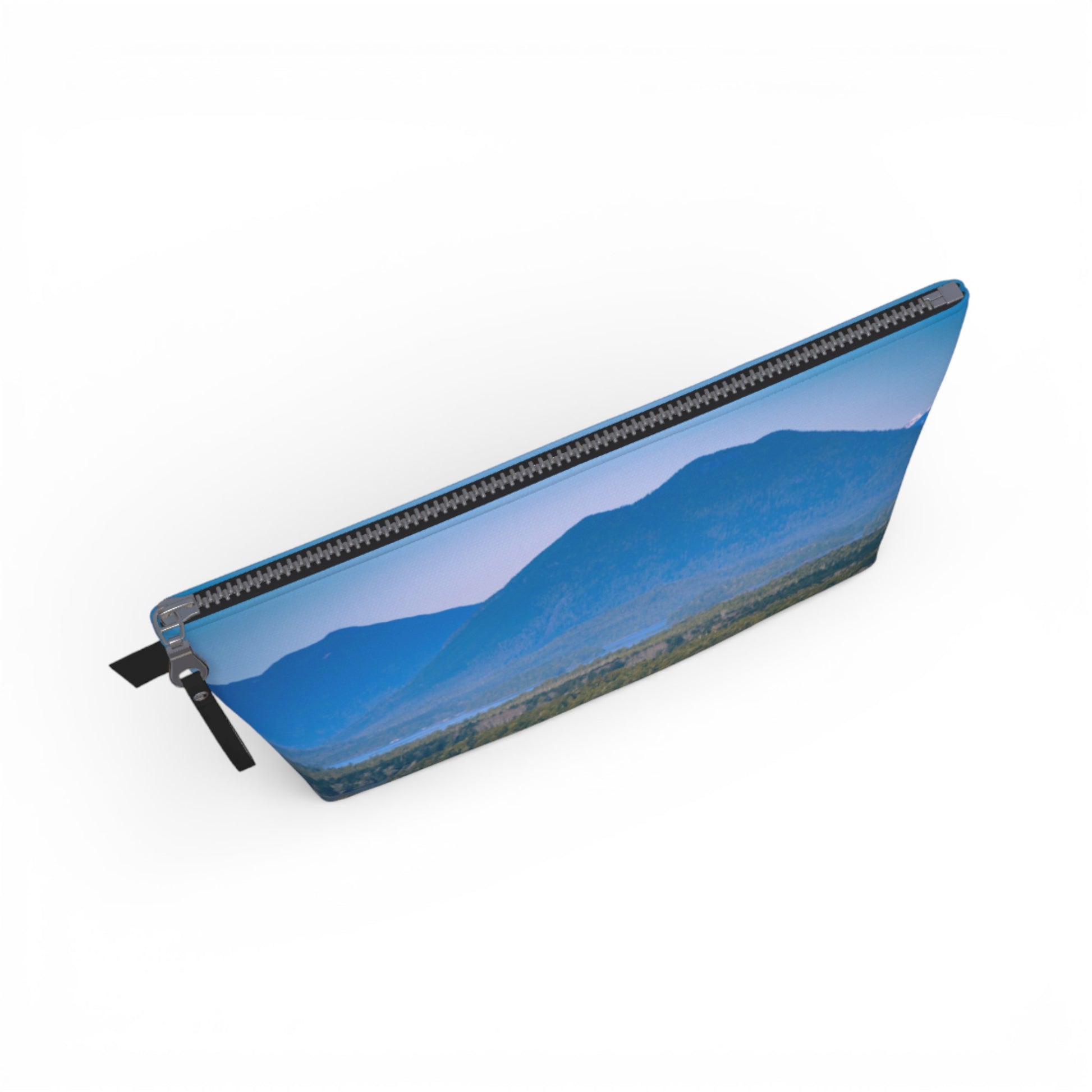 Rectangular pouch with a mountain landscape design on a white background