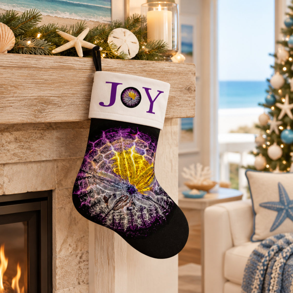 A personalized Christmas stocking hanging from a fireplace mantel in a cozy living room. The stocking has a white cuff with the word 'JOY' in purple letters and a circular monogram, decorated with a purple, black, and yellow seashell design.