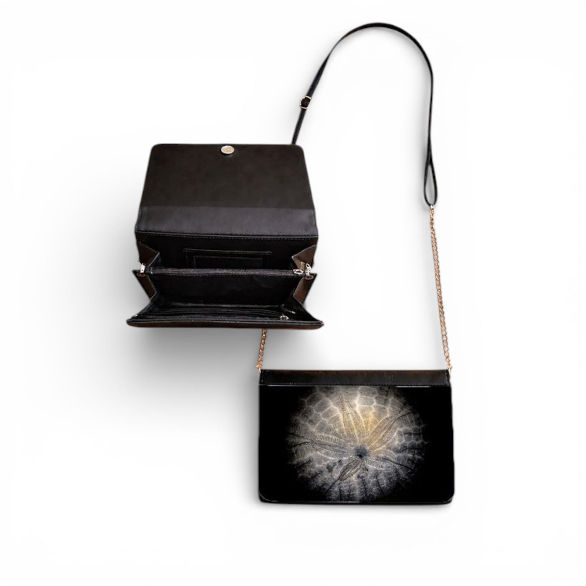 Black handbag with a Sand Dollar design on a white background