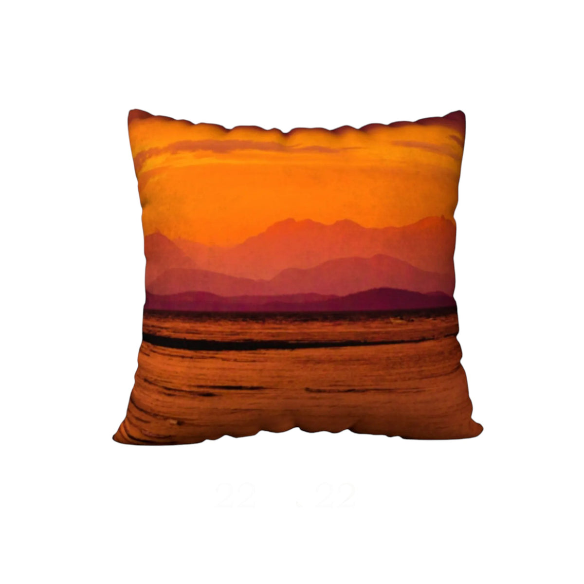 A square decorative throw pillow featuring a scenic sunset landscape print with orange and yellow sky, layered mountains, and a dark reflective foreground, shown on a plain white background.