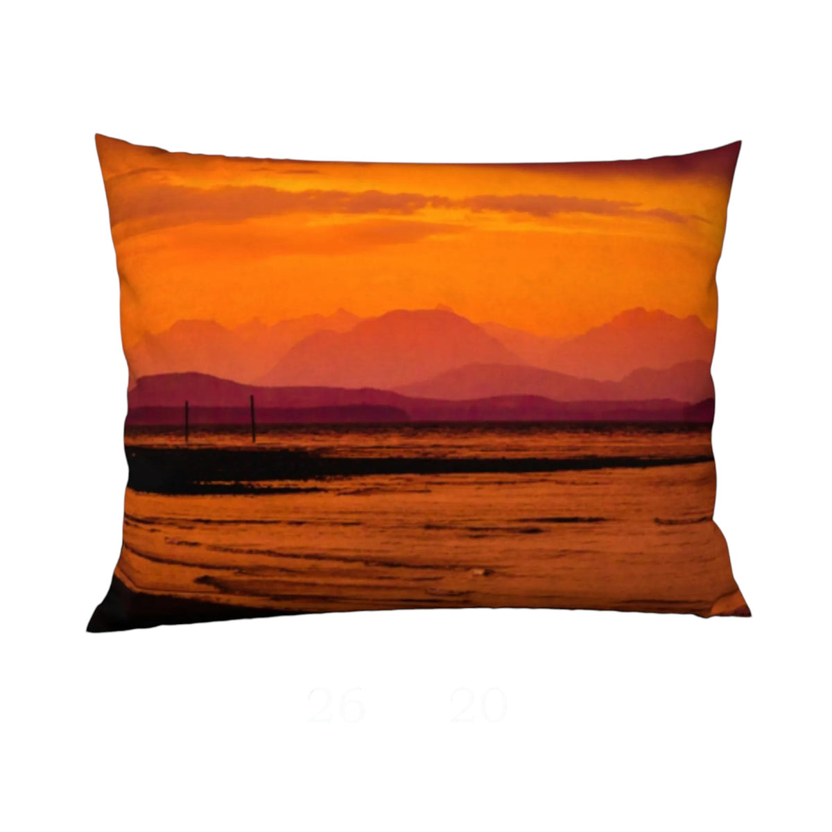 A rectangular throw pillow featuring a scenic sunset landscape print with orange and yellow sky, layered mountains, and a dark foreground, shown against a plain white background.