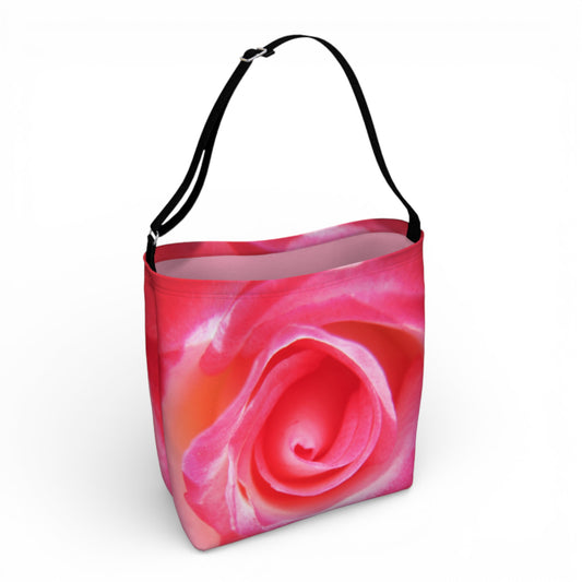 Tote bag with a pink rose design on a white background