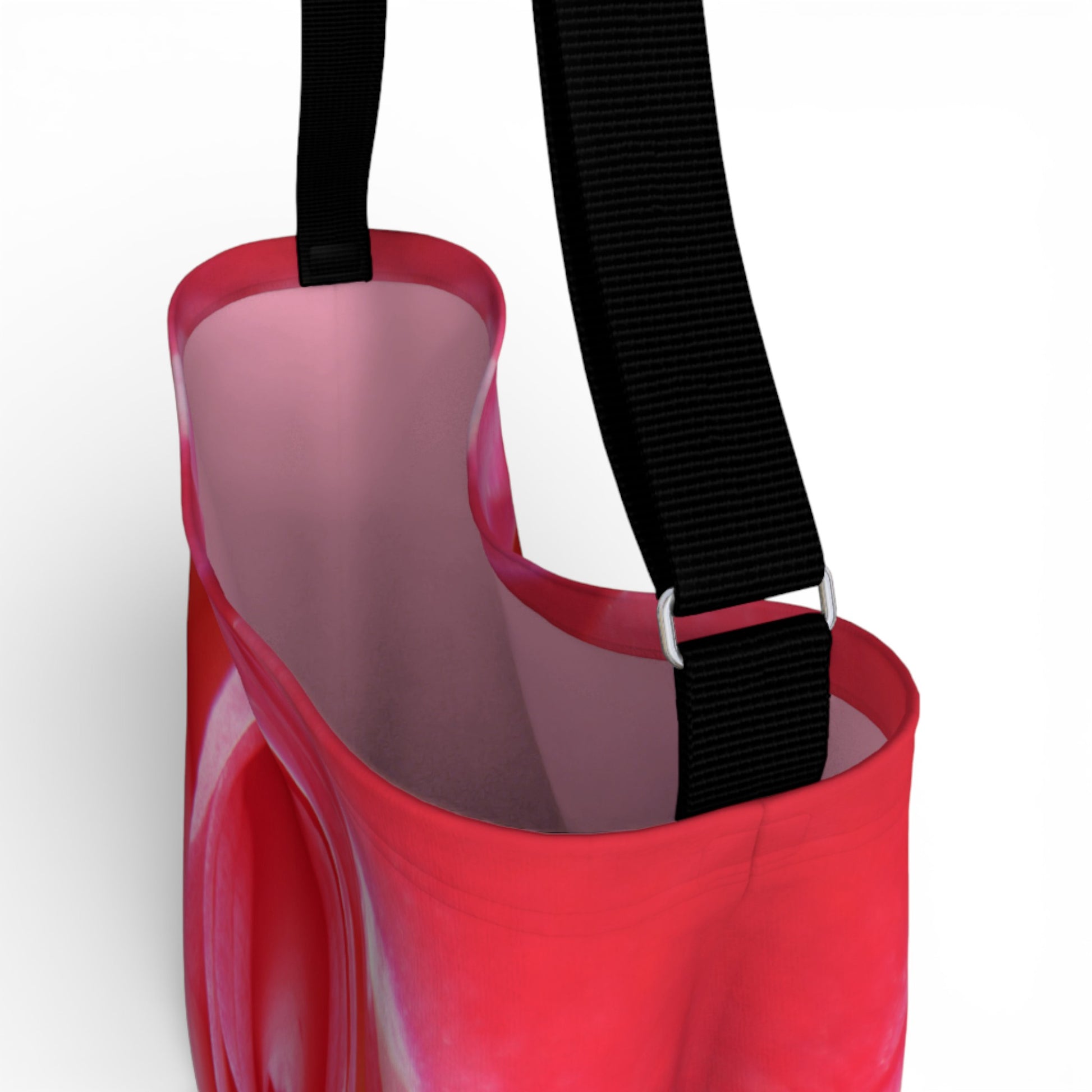 Rose bag with a black strap on a white background