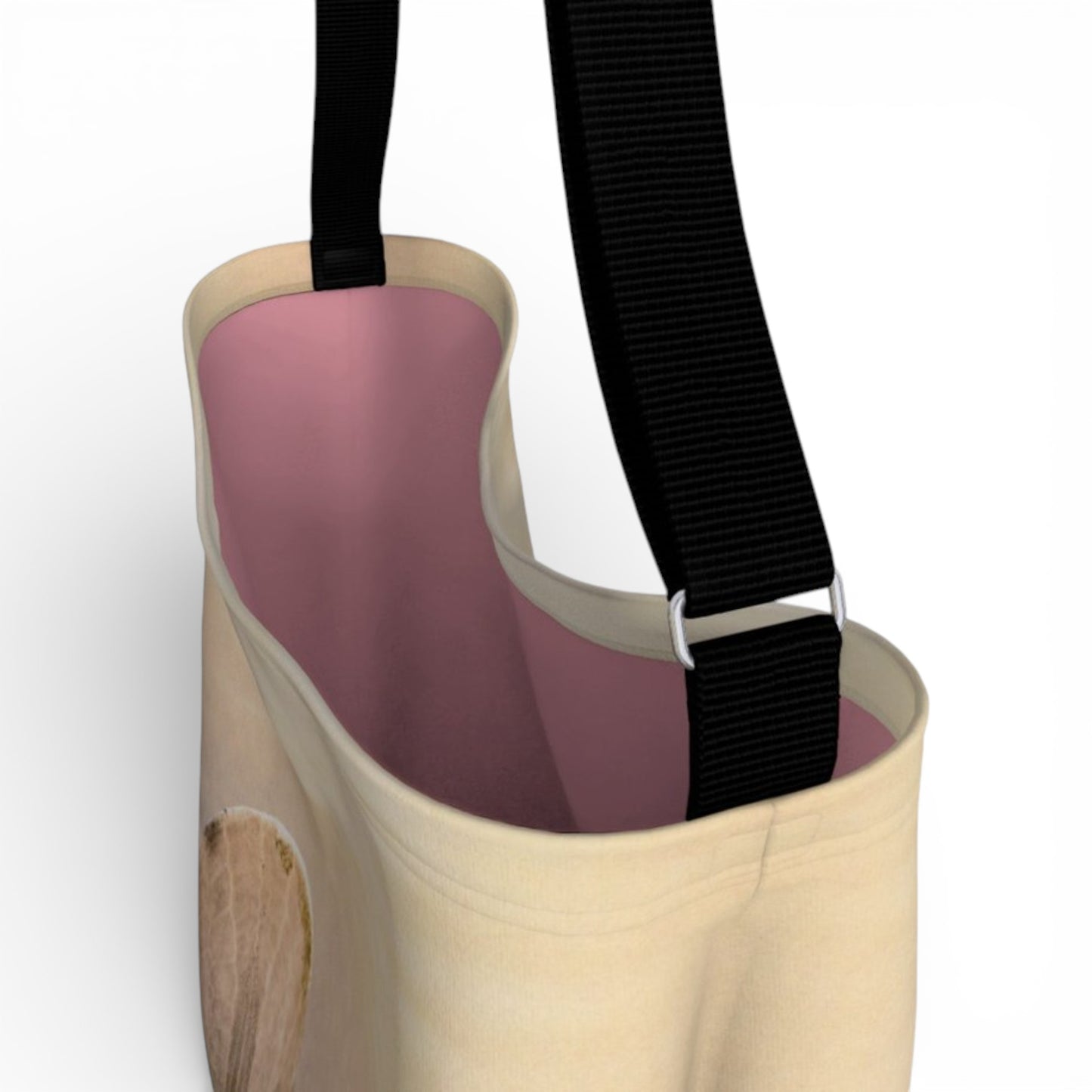 Close-up of a tote bag black strap on a white background