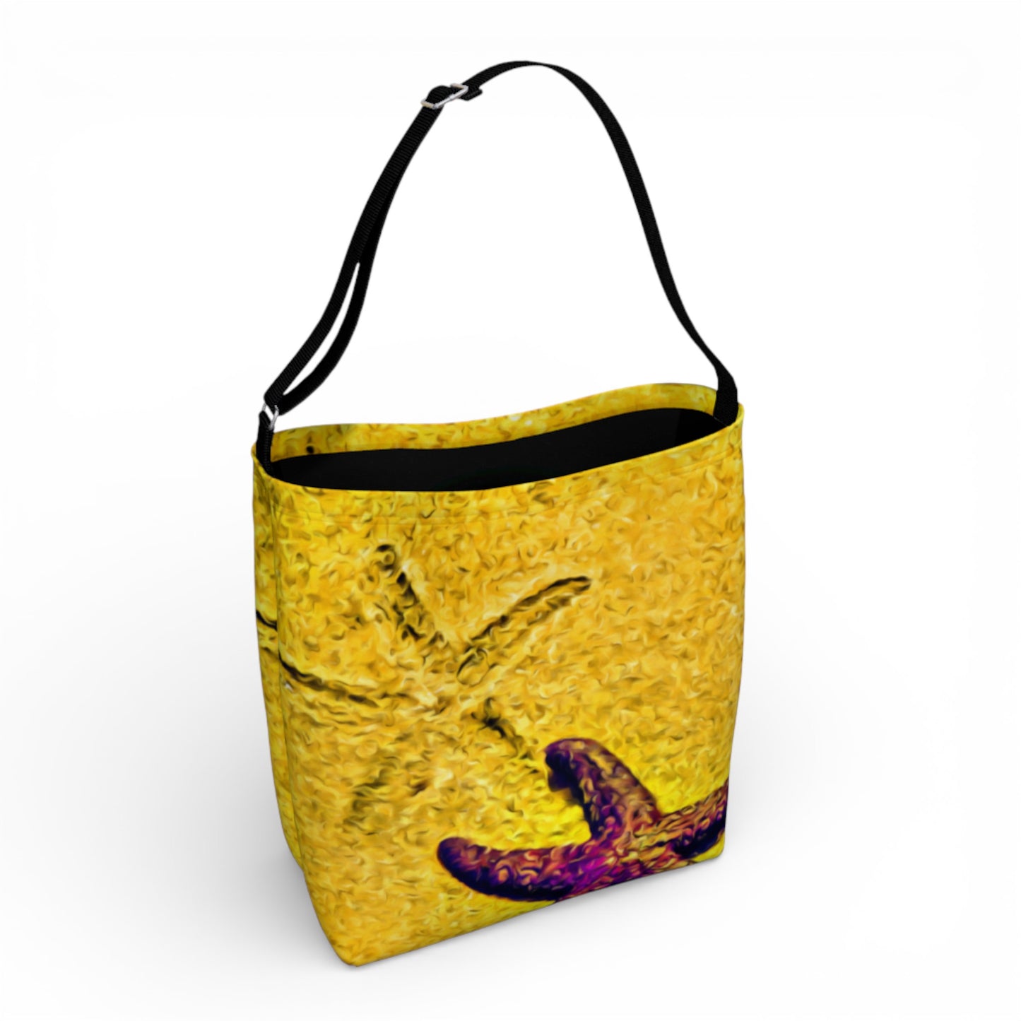 Yellow bag with a textured surface and black strap on a white background