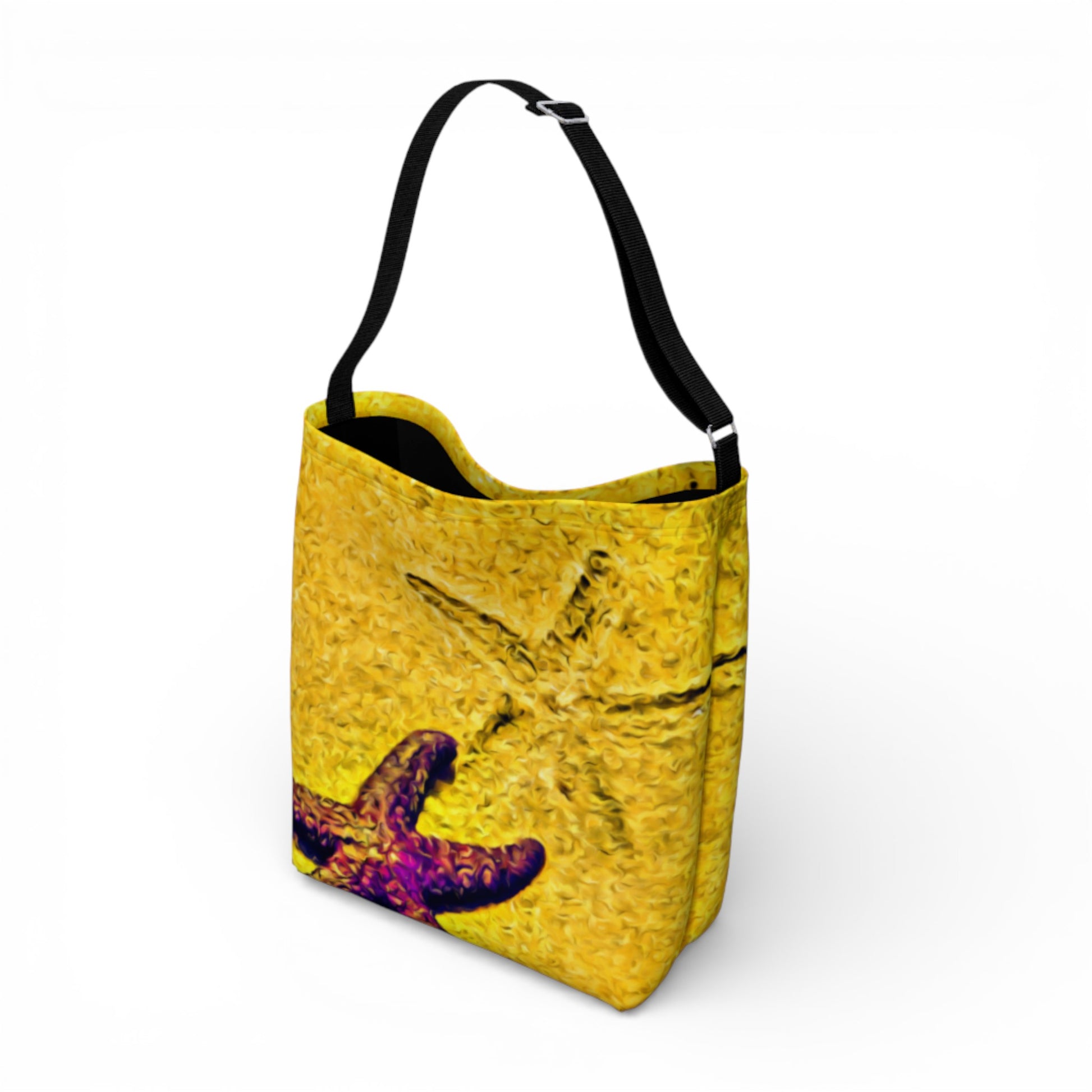 Yellow tote bag with a starfish design on a white background