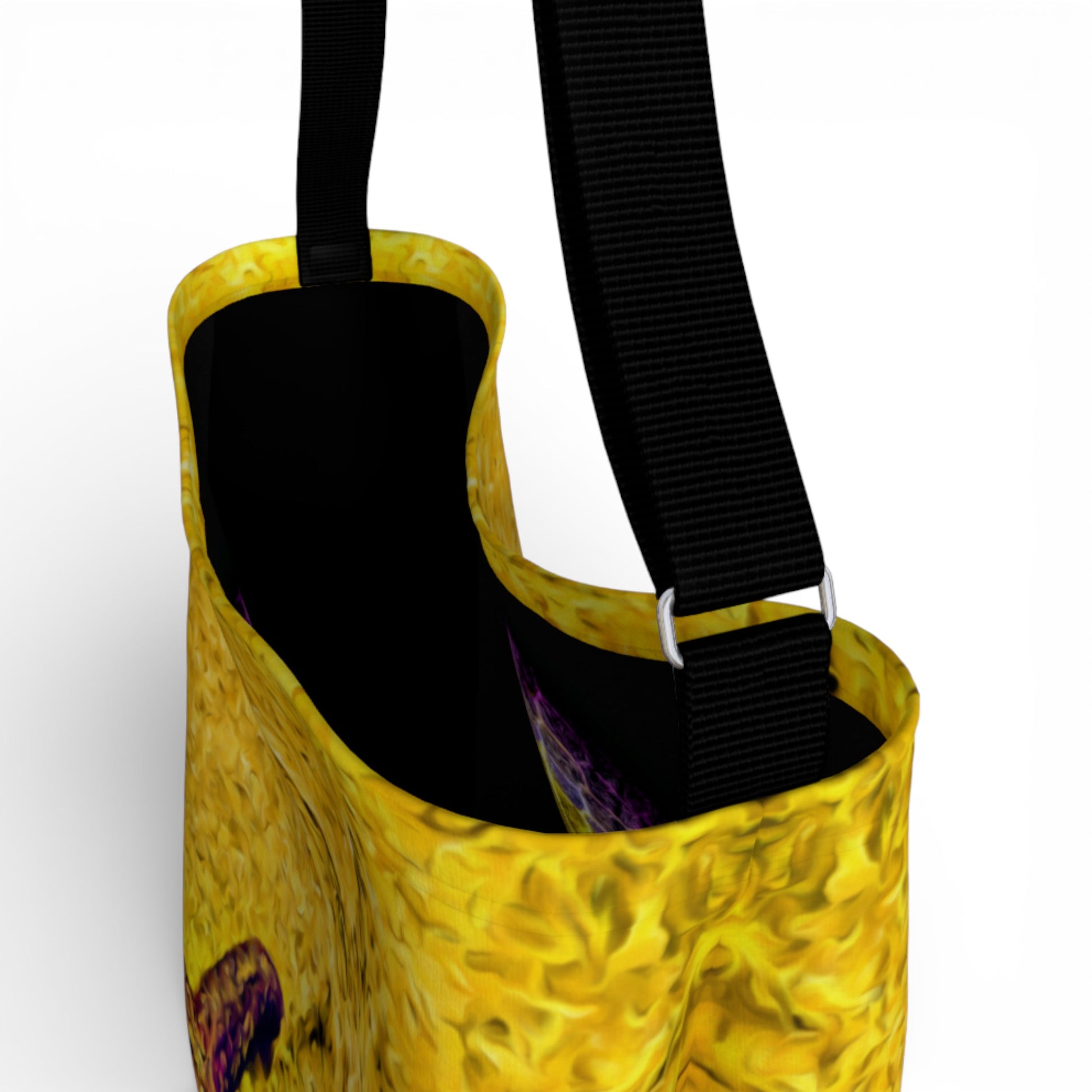 Yellow bag with black straps on a white background