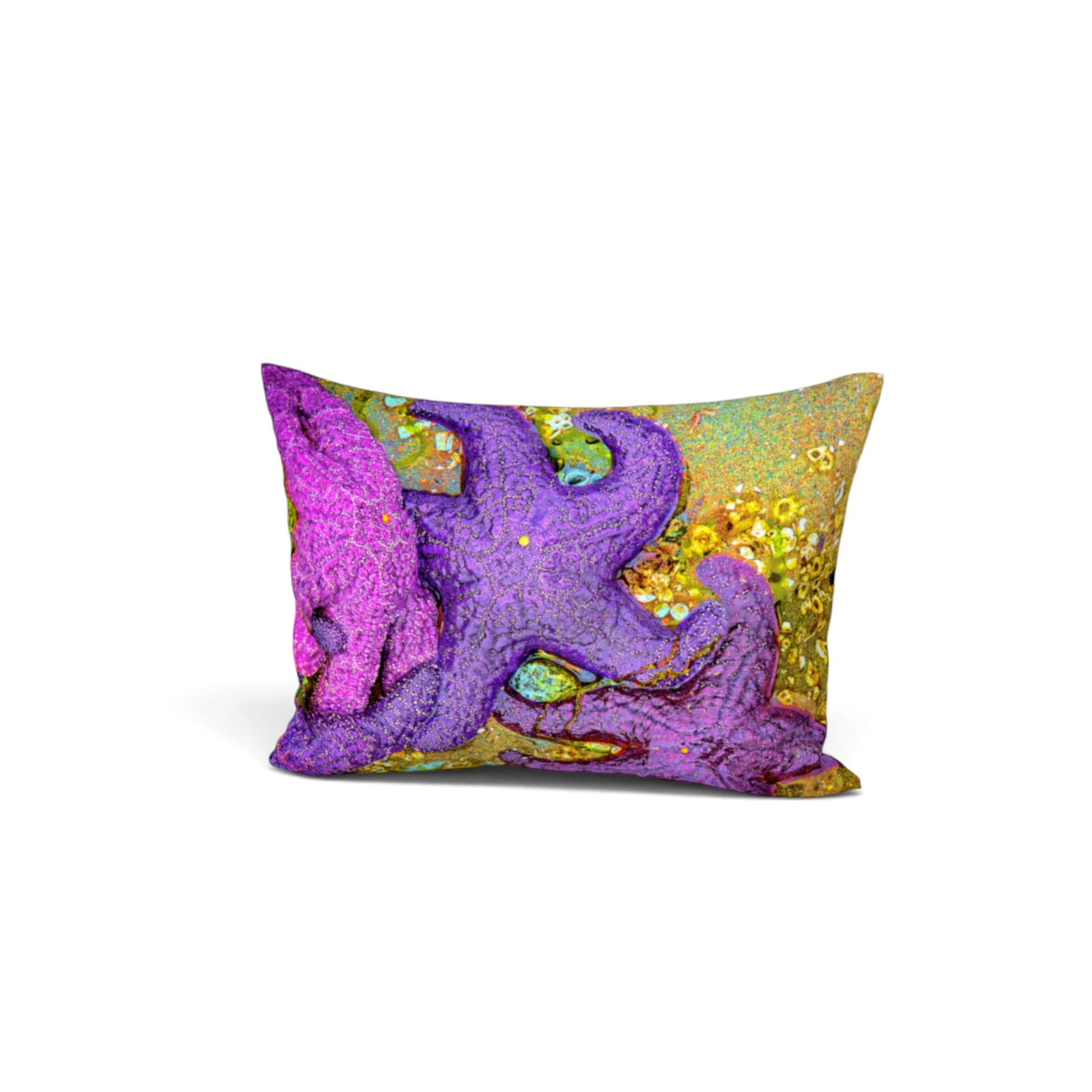 A rectangular throw pillow featuring a vibrant, textured print of purple starfish and sea urchins on a gold glittery background, shown against a plain white studio backdrop.