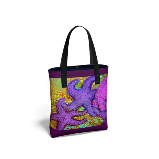 Tote bag with purple starfish design on a white background