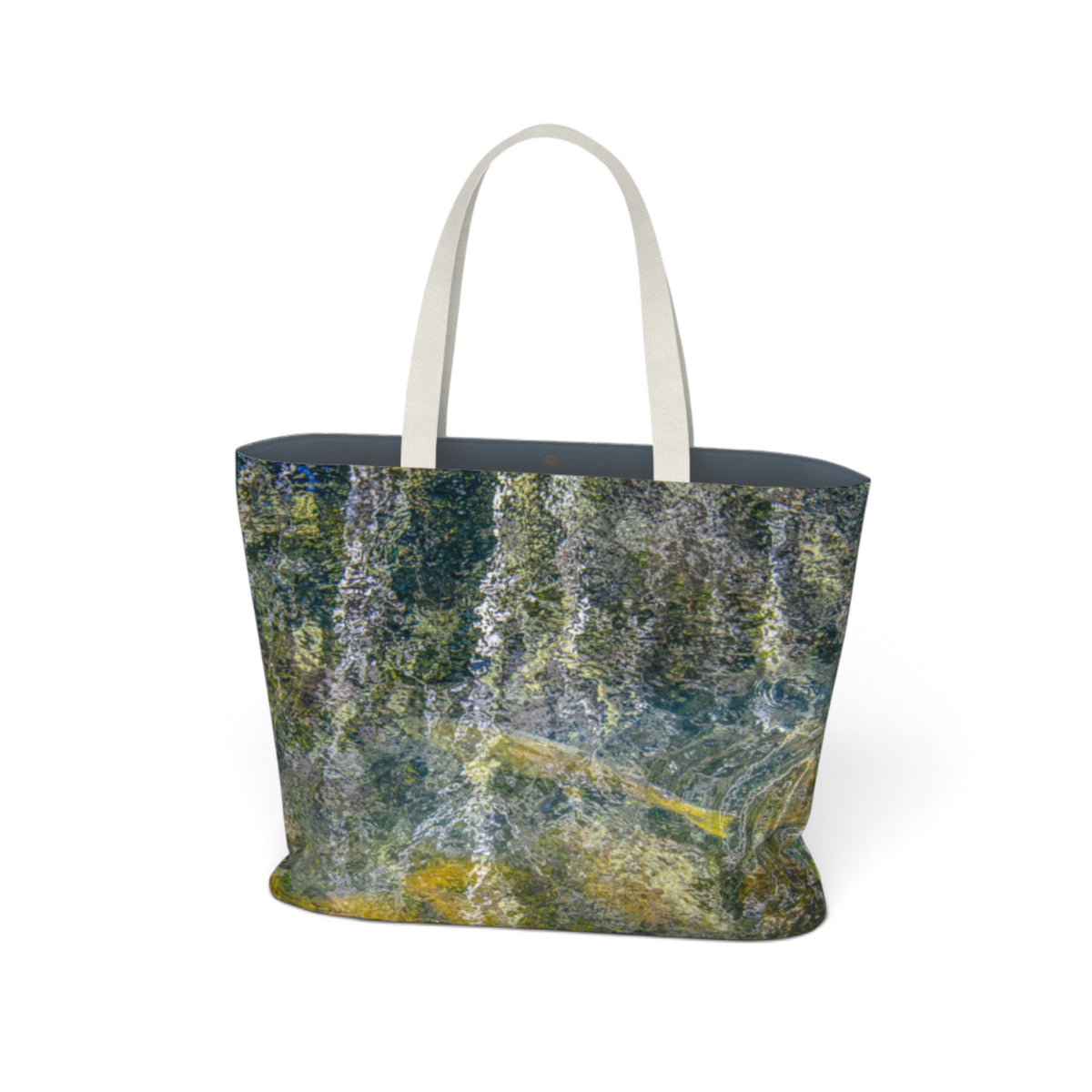 A tote bag featuring an abstract, textured print resembling watercolor or impasto brushstrokes in shades of green, blue, gray, and yellow. The bag has off-white shoulder straps and a dark gray interior lining, shown against a plain white background.