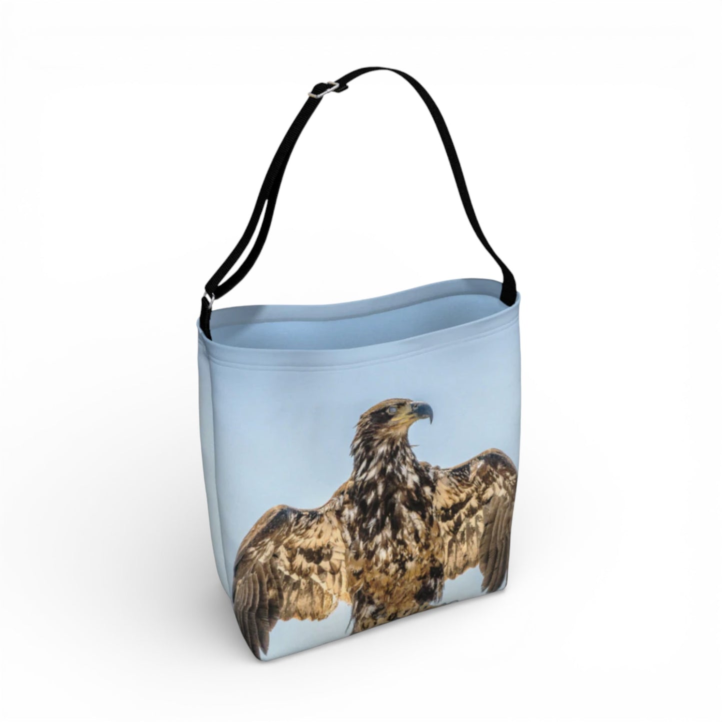 Tote bag with an eagle design on a light blue background
