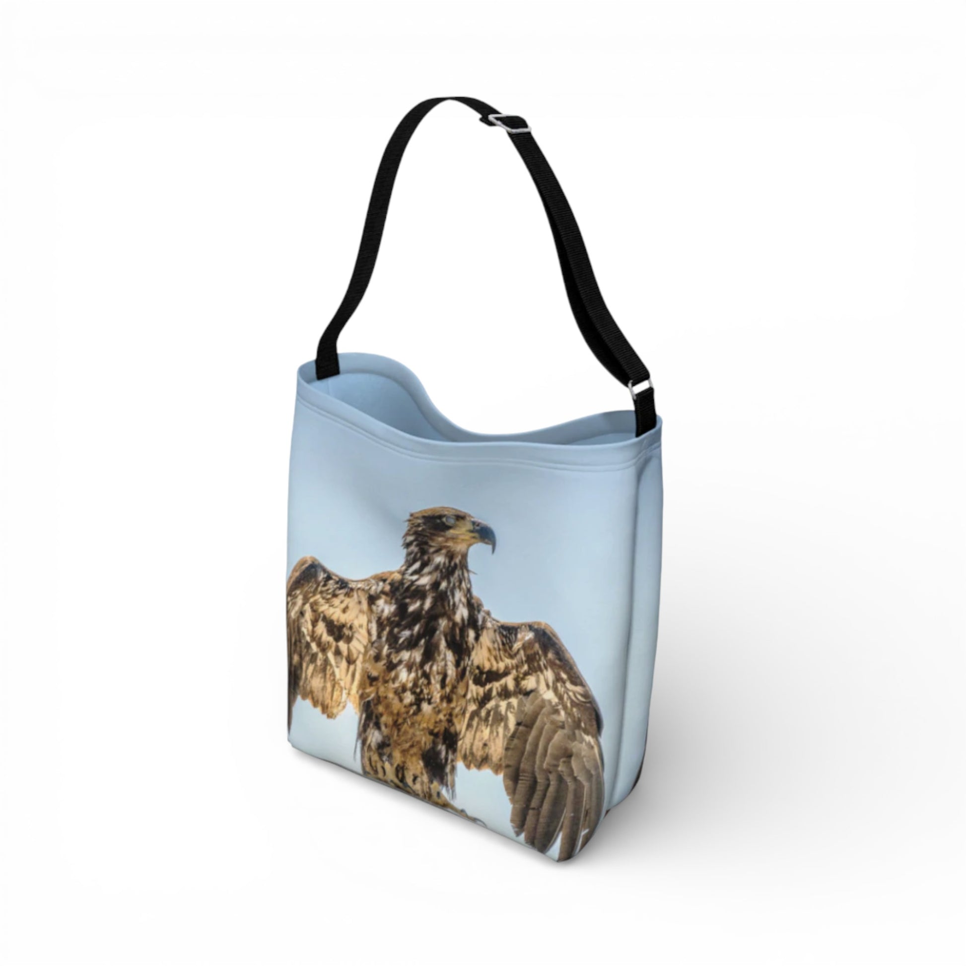 Tote bag with an eagle design on a light blue background