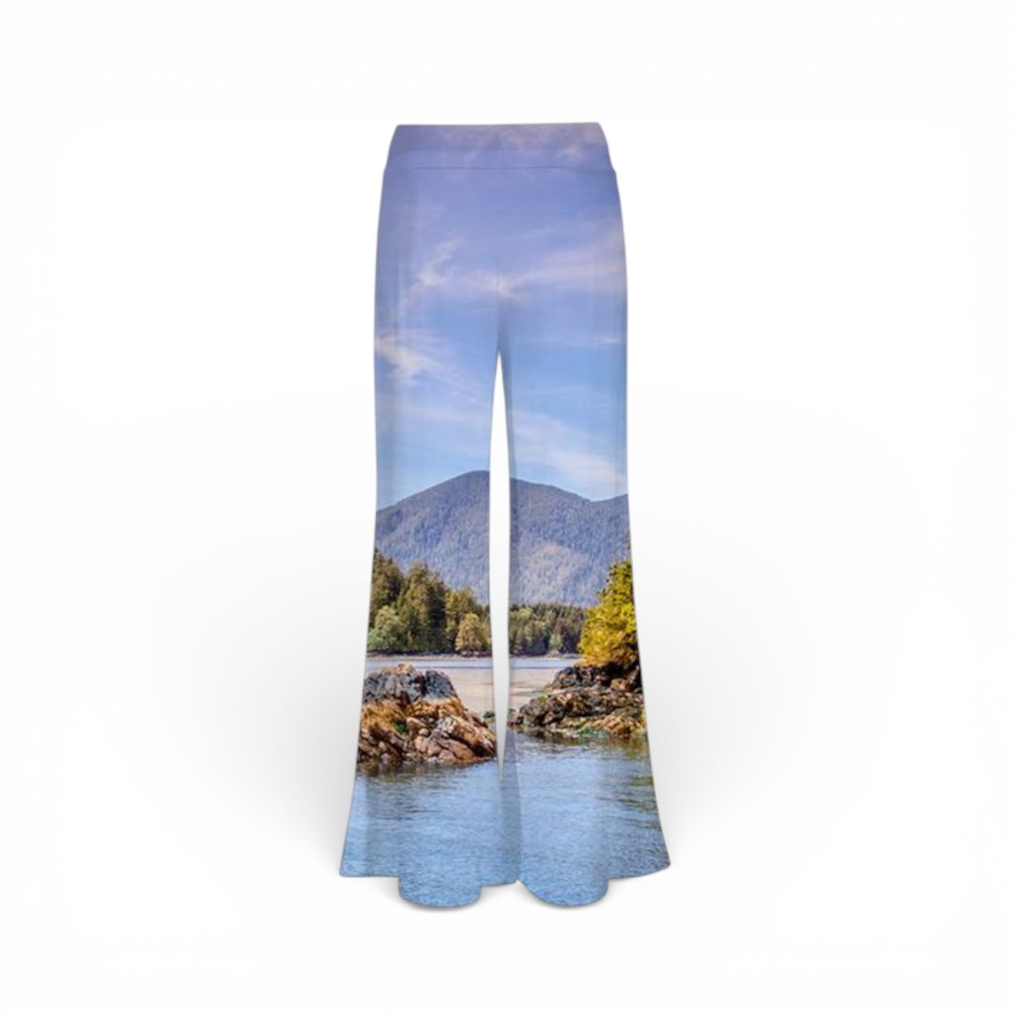 Pants with a scenic print of a ocean and mountains on a white background
